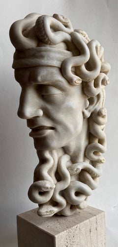 Head of the mythological Medusa carved from white Carrara marble—made in Italy