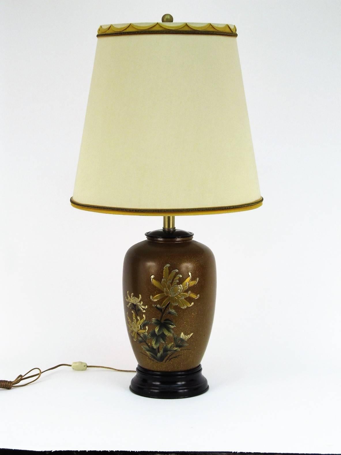 The condition of this lamp is immaculate. It comes with the original shade, and finial. And the shade is also beautifully decorated with trim at the top and bottom. It has a three way socket switch, as well as an on/off line switch. Marbro Label