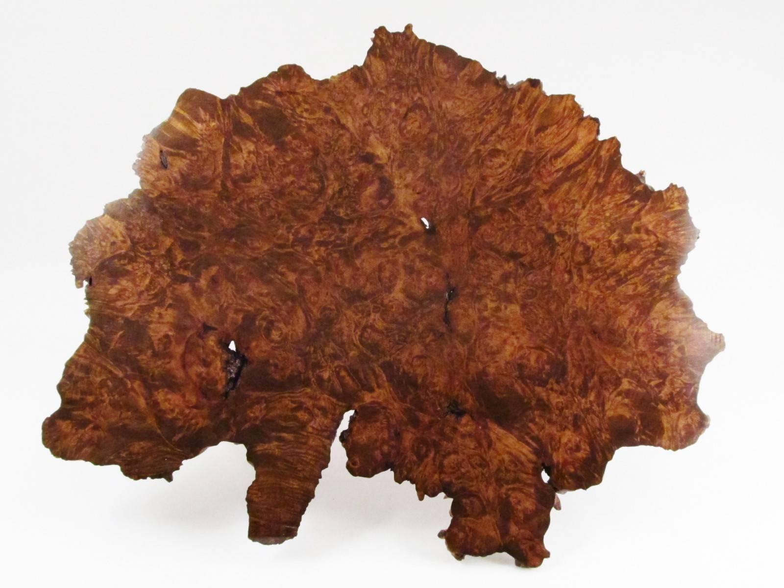 This is a very unusual piece of Carpathian elm burl. Burl pieces like this are usually sliced up into veneer, because it is rare to find pieces of any scale, and it's too valuable as veneers to do anything else with it. 

I recently purchased this