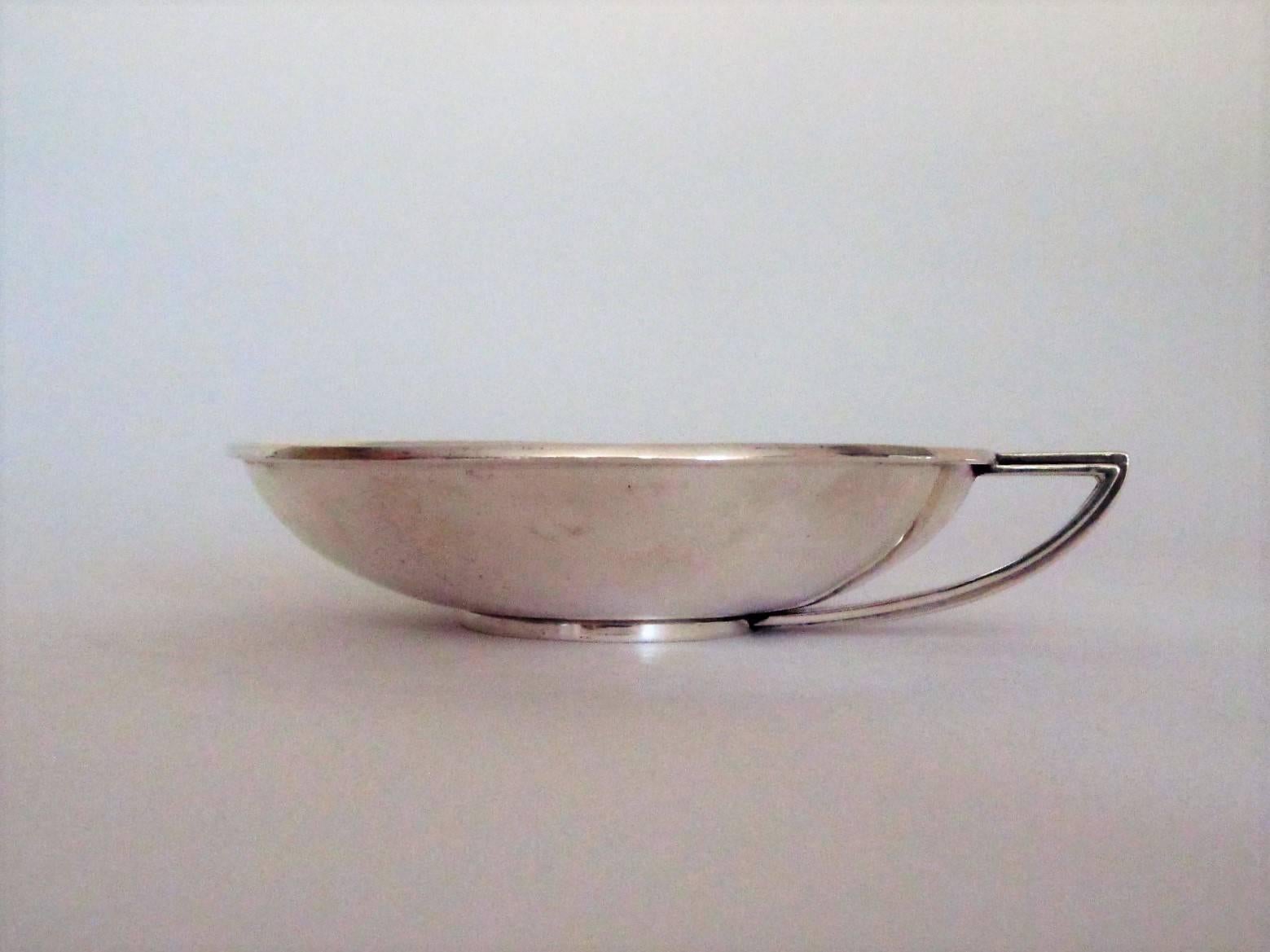 This lovely handmade sterling bowl is by Danish silversmith Hans Hansen and is marked with the date 