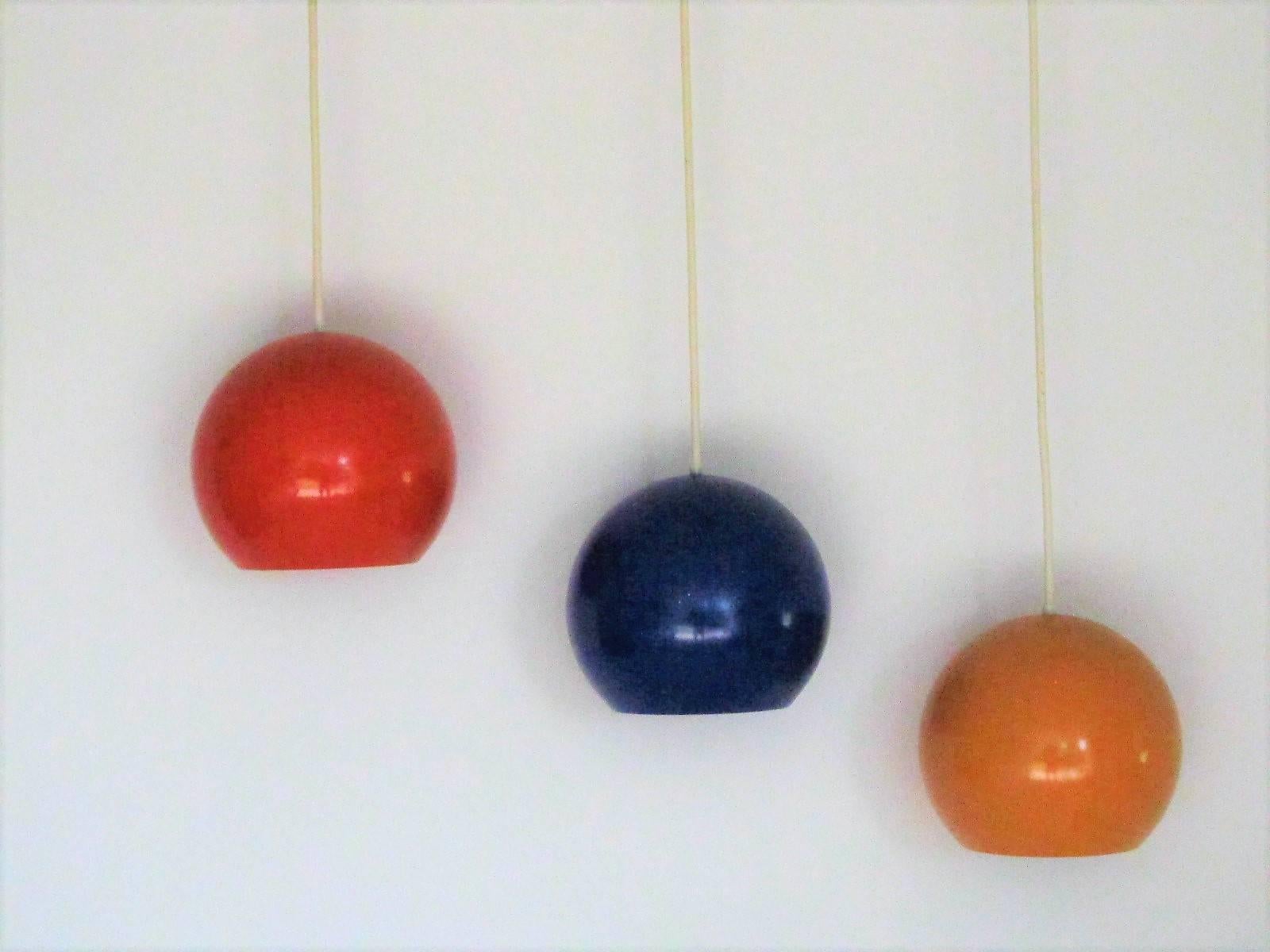 These would make a cheerful and colorful statement in any modern interior. 

There are three separate fixtures, each with its own separate ceiling cap. So they can be arranged in any configuration one prefers. Each lamp comes with approximate 30