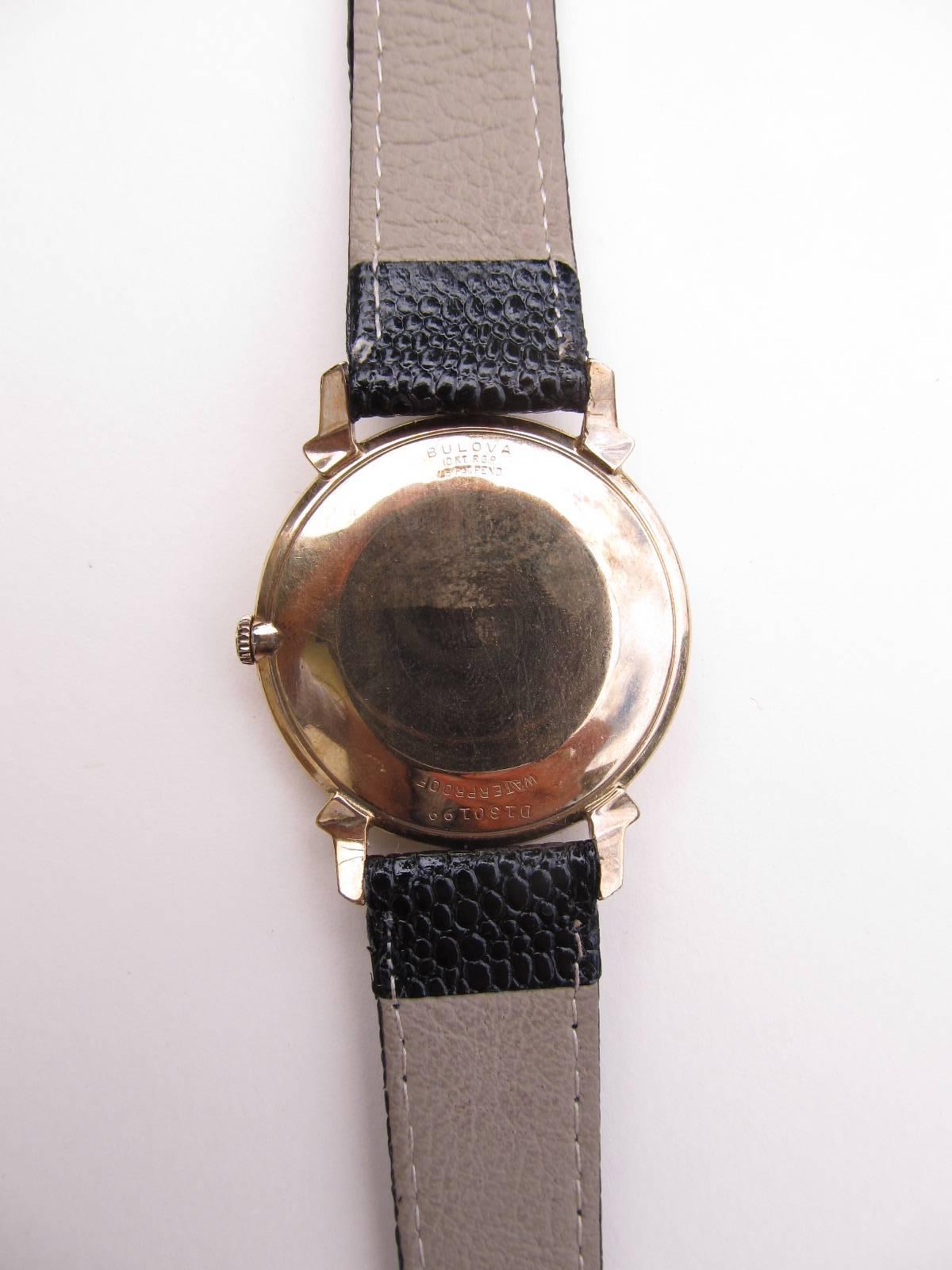 Beautiful clean lines define this watch. Extremely thin profile, and elegant lugs. Date code on the back, L8, date this watch to 1958. Waterproof, and 10-karat RGP, marked on the back.