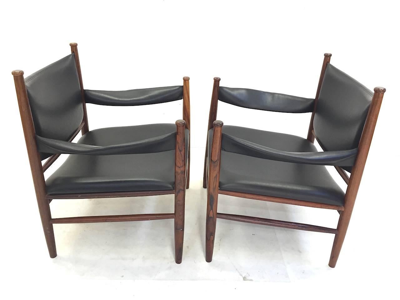 Exceptional pair of rosewood Safari lounge chairs. Excellent original condition.