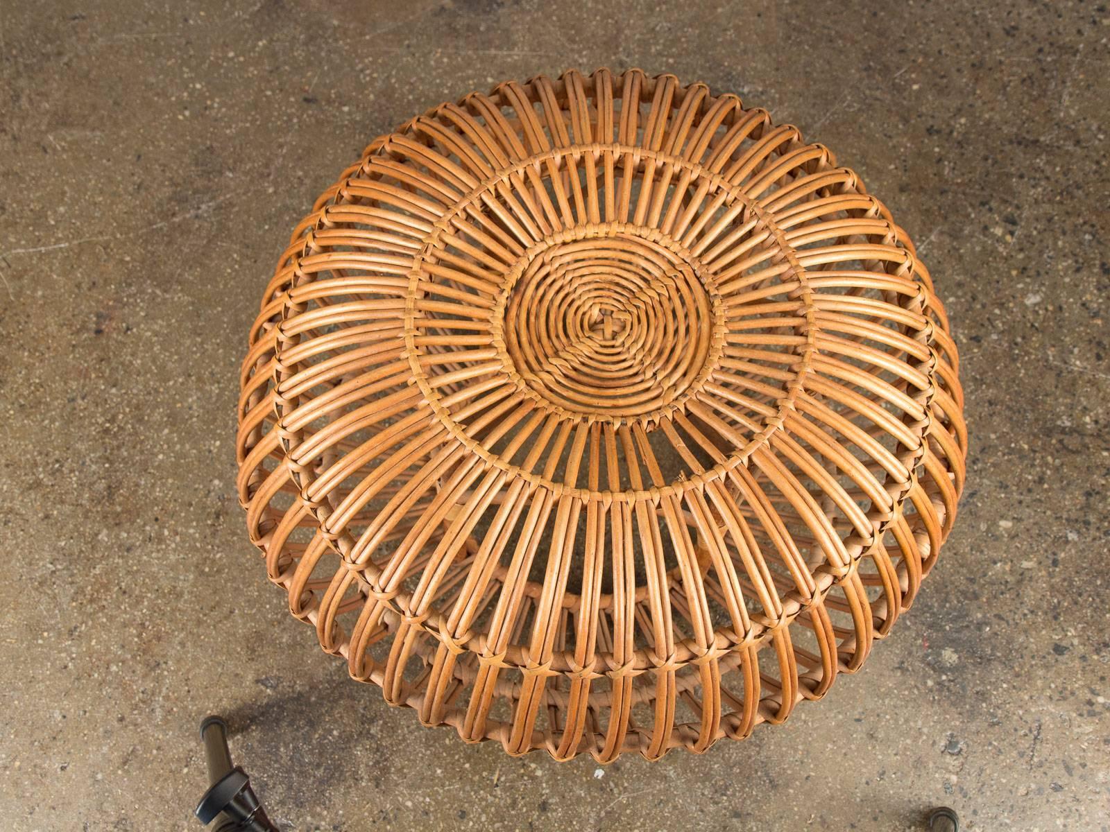 Vintage Albini foot stool woven of rattan. In excellent condition with a few small breaks. Stunning and sturdy.

Measures: 25