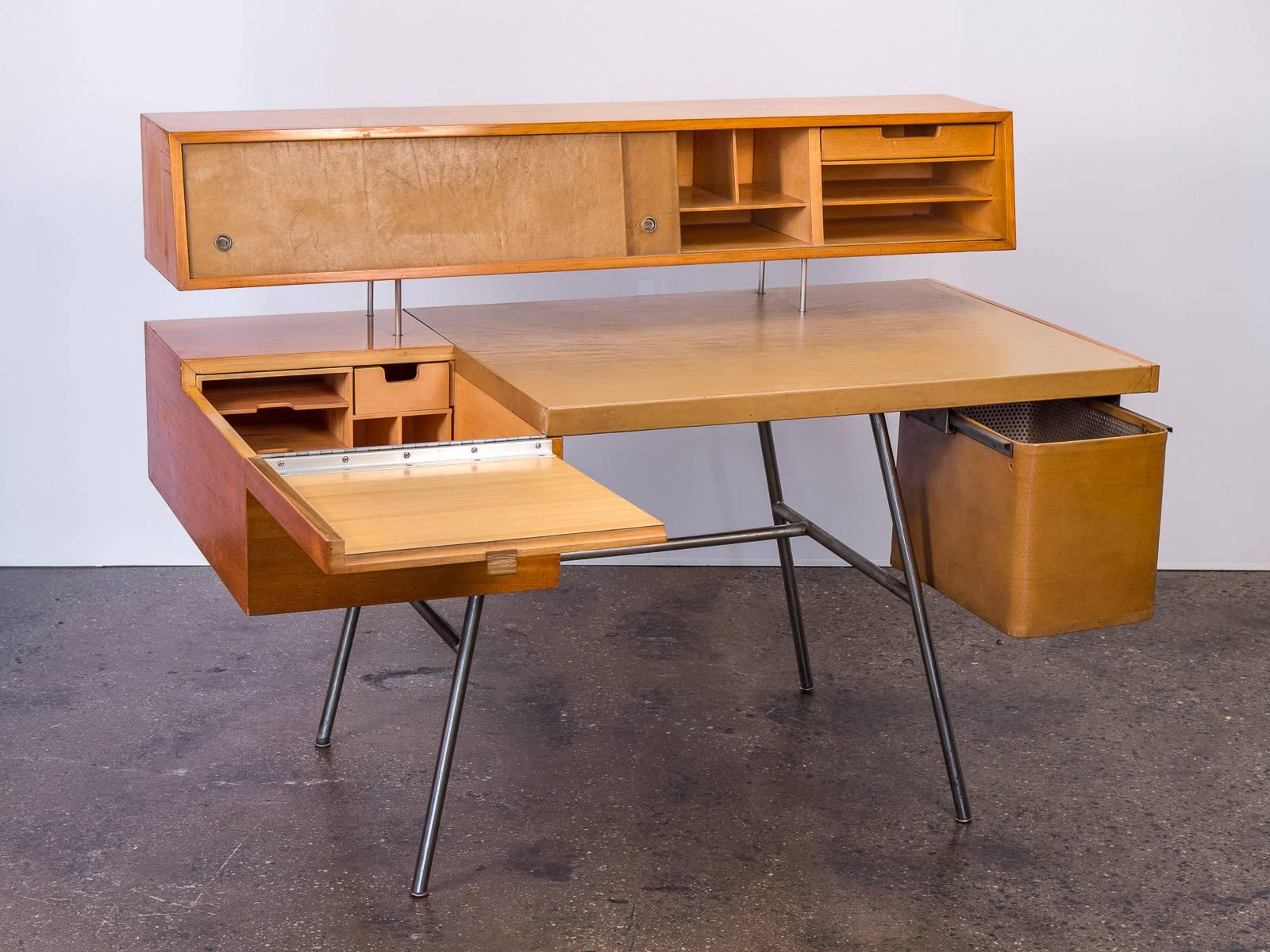 All original, Home Office Desk, model 4658 by George Nelson and George Nelson Associates for Herman Miller. This seminal desk was designed in 1946, paving the road for modern office design. Nelson's desk re-imagined and redefined working spaces,