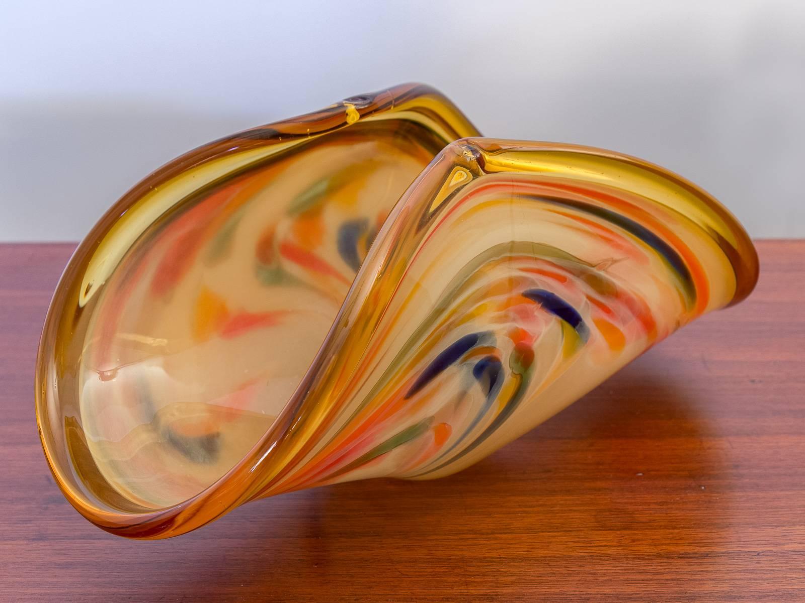 Fine, Italian Murano white crystal art glass. Warm orange and ultramarine meld into each other to form this fetching, abstract centerpiece. Murano label on the underside. Handblown in Italy.