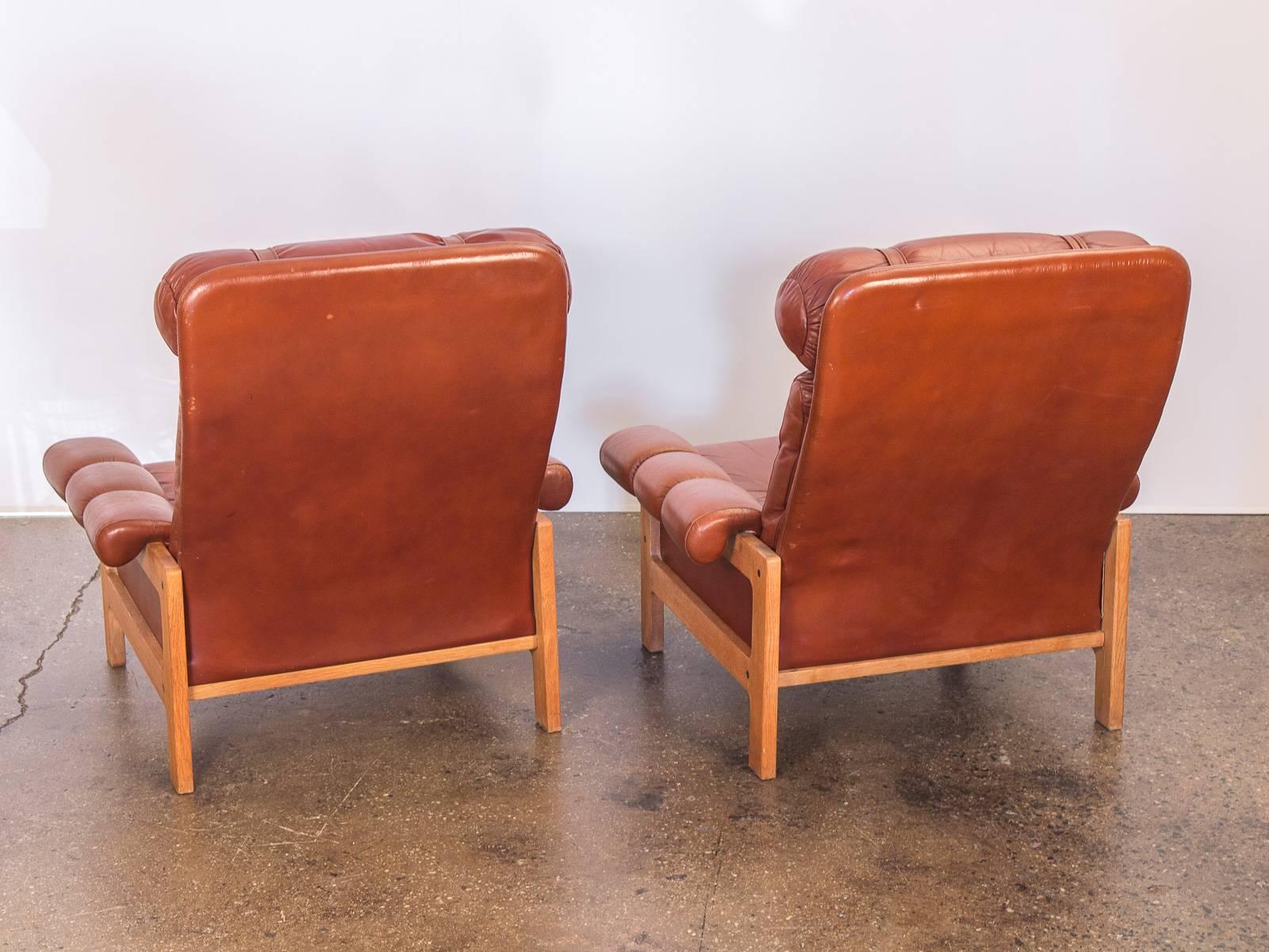 Pair of Tufted Chestnut Lounge Chairs In Excellent Condition In Brooklyn, NY