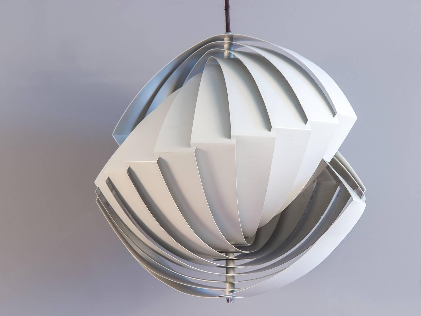 Scarce, elegant, hanging pendant light by Louis Weisdorf for Lyfa. Danish for "conch," the Konkylie follows the shell's form, resulting in this stunning, functional sculpture. Smartly designed to reduce glare, and emits a soft luminous