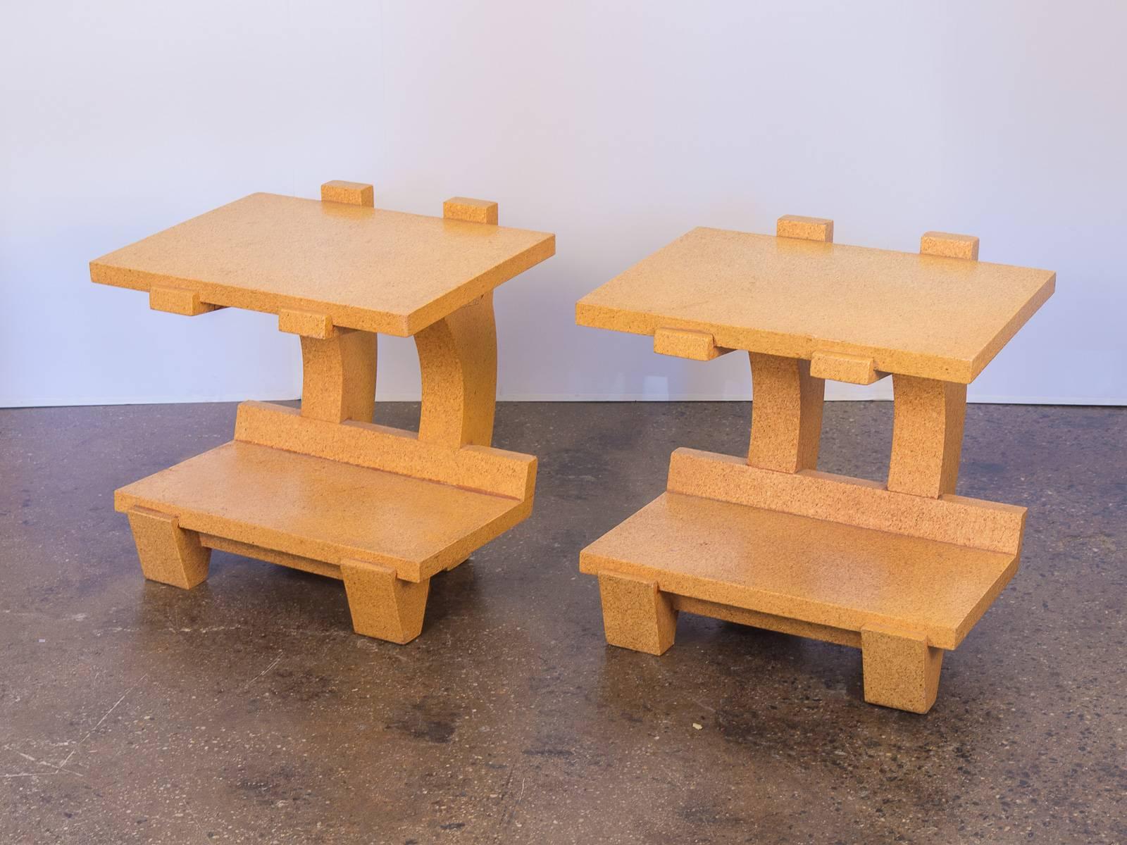 Sold as a pair. Postmodern pair of cork side tables by Kevin Walz for KorQinc. Cantilever form is geometrically striking without appearing chunky. Cork material gives a contemporary freshness and texture. In wonderful vintage condition with