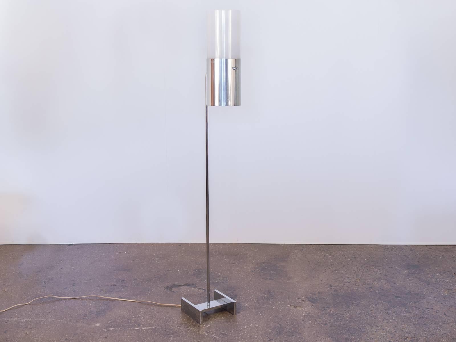 Sleek Robert Sonneman chrome floor lamp with acrylic, cylindrical shade. This elevated, Industrial modern light has a soft white, acrylic shade that distributes light evenly, and fully articulates in every direction. Has some age-appropriate wear,