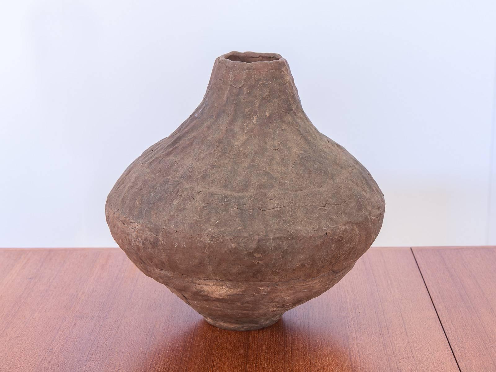 Organic, ceramic art pottery vase. Excellent vintage condition. Coil vase form echoes the indentations of the hands that built it. Pair it with some clean, modernist forms to compliment its natural, earthy presence.
