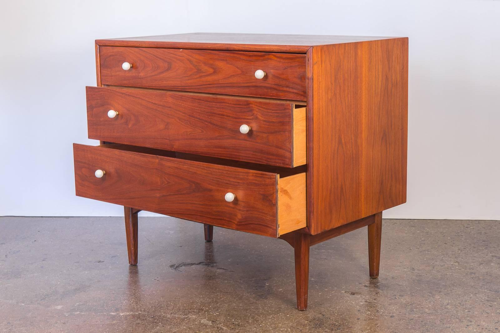 Declaration vanity dresser by Kipp Stewart and Stewart MacDougall for Drexel. This clean walnut dresser has been polished and oiled, and is in excellent vintage condition. Pretty walnut grain is attractive and gleaming. Surface is very clean with no