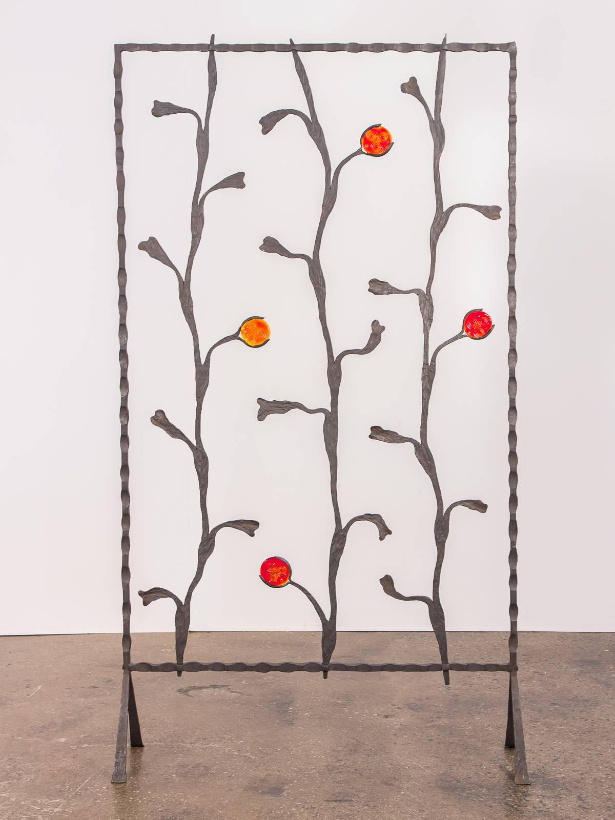 Brilliant and uniquely constructed, artisan free-standing wrought iron screen. Acquired from the original owner, this stunning decorative arts piece was purchased back in the early 1960s at an arts fair to showcase Eastern European art and artisans.