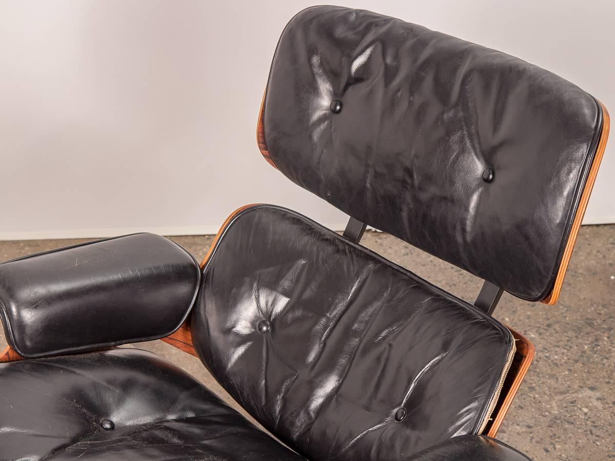 Leather Pair of 1960s Eames 670 Lounge Chairs and 671 Ottomans