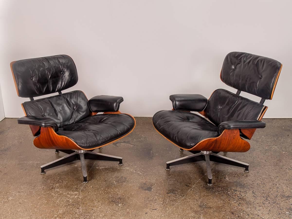 Newly acquired from the original owner, a pair of early 1960s, second generation Eames 670 Lounge Chairs and matching 671 Ottomans. Both retain their original leather that is in amazing condition—lovingly worn and comfortably plush, with a nicely