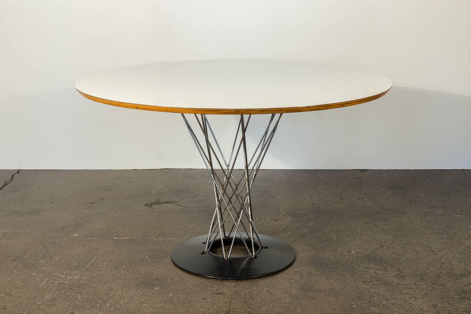 Designed by Isamu Noguchi for Knoll. Acquired from the original owner, who purchased it new in the late 1950s. Table top shows some wear, otherwise excellent. Knoll label present.

47.5