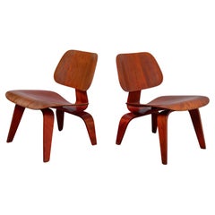 Used Eames Evans Red Aniline Dye LCW Lounge Chairs - Matched Pair  