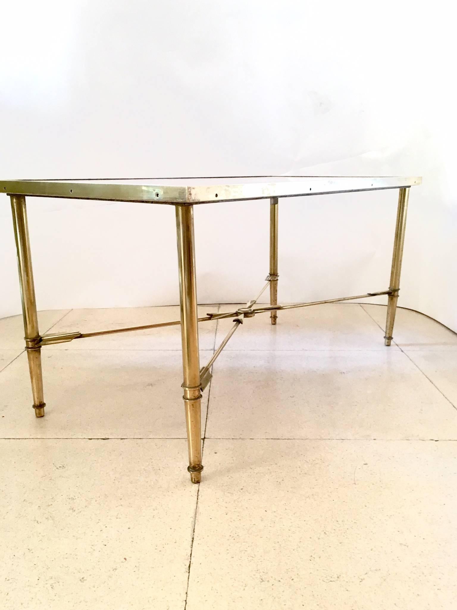 French Jansen style in gold metal with arrows and travertine marble top.