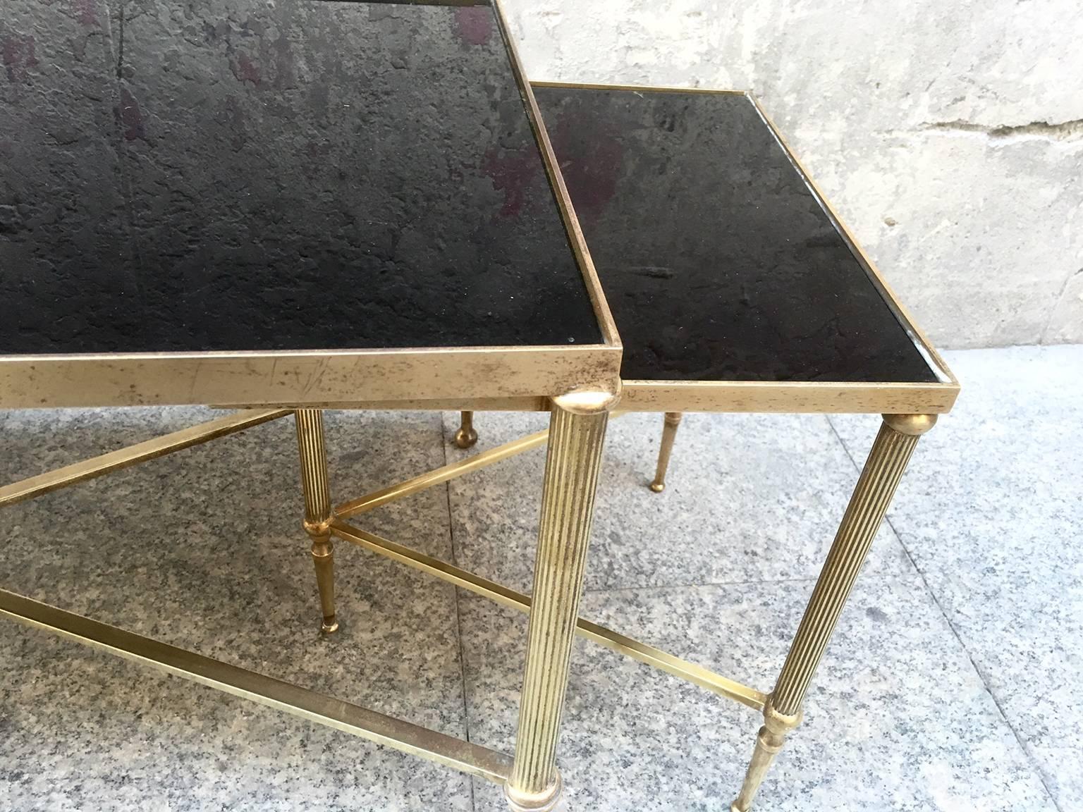 Maison Jansen neoclasical style gilt brass coktal table with two nesting tables, opaline glass top.