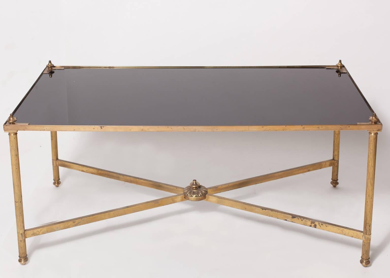 Pair of Maison Jansen French brass Mid-Century coffee tables, with black glass top.