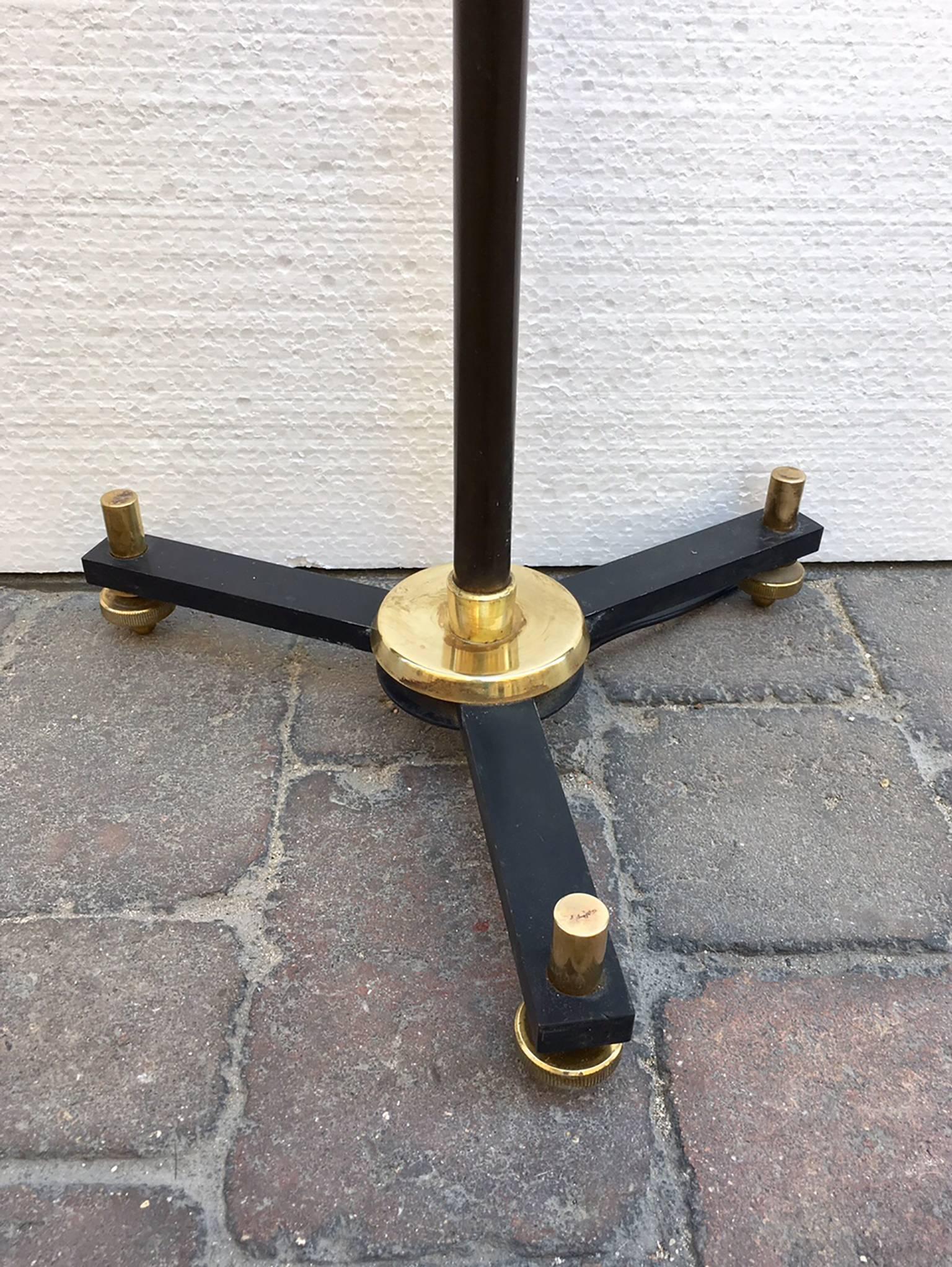 Pair of Spanish floor lamps.brass and black lacquered metal, lampshades in black patent leather and interior in gold.