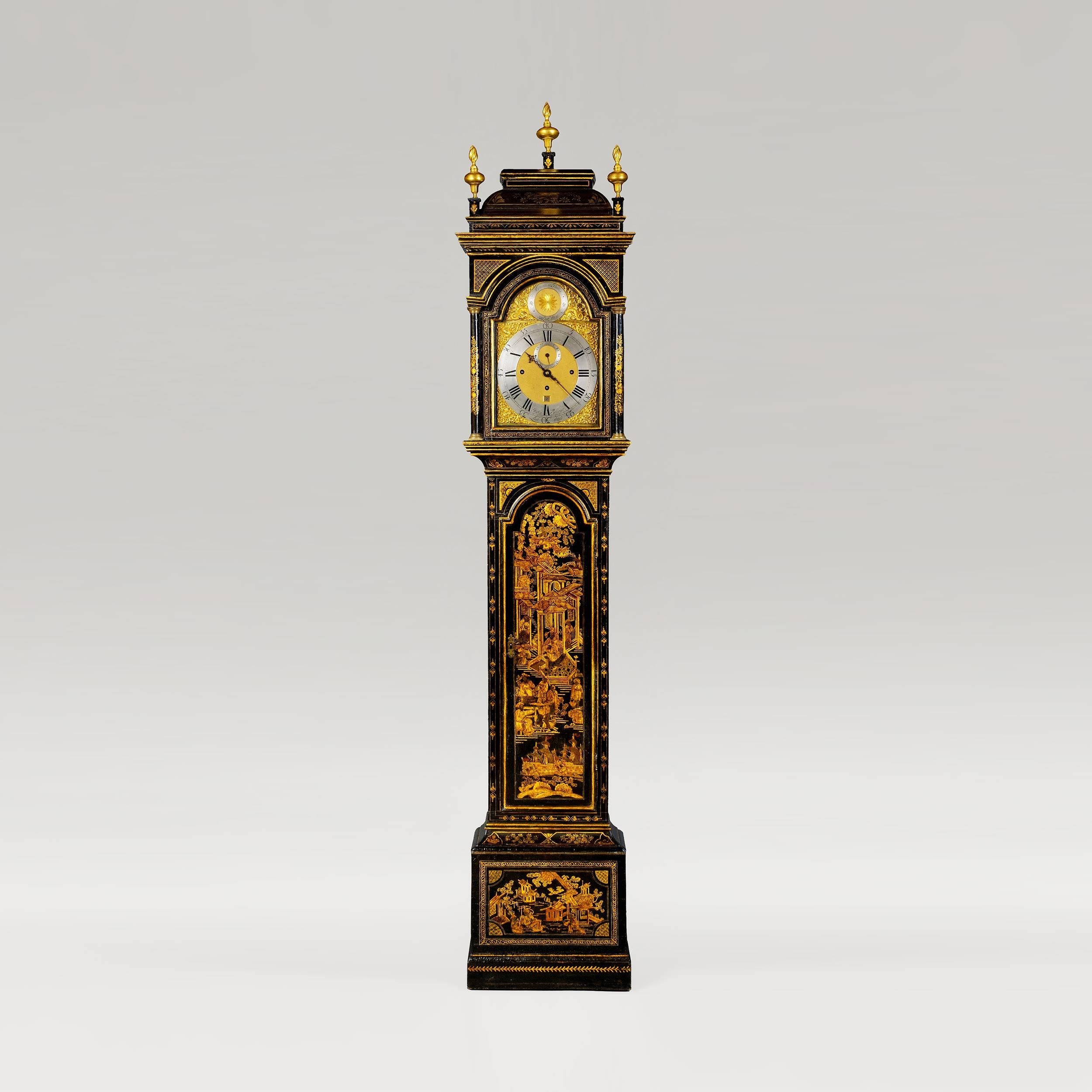 A Longcase Clock with a Musical Movement 
by John Ellicott, Clockmaker to King George the Third

Housed within a Chinoiserie lacquered case, having an inspection door, the domed top with brass flambeau finials, the hood housing the John Ellicott