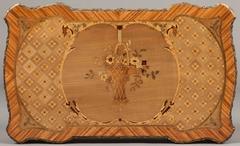 Table française du 19ème siècle en marqueterie florale et bronze doré