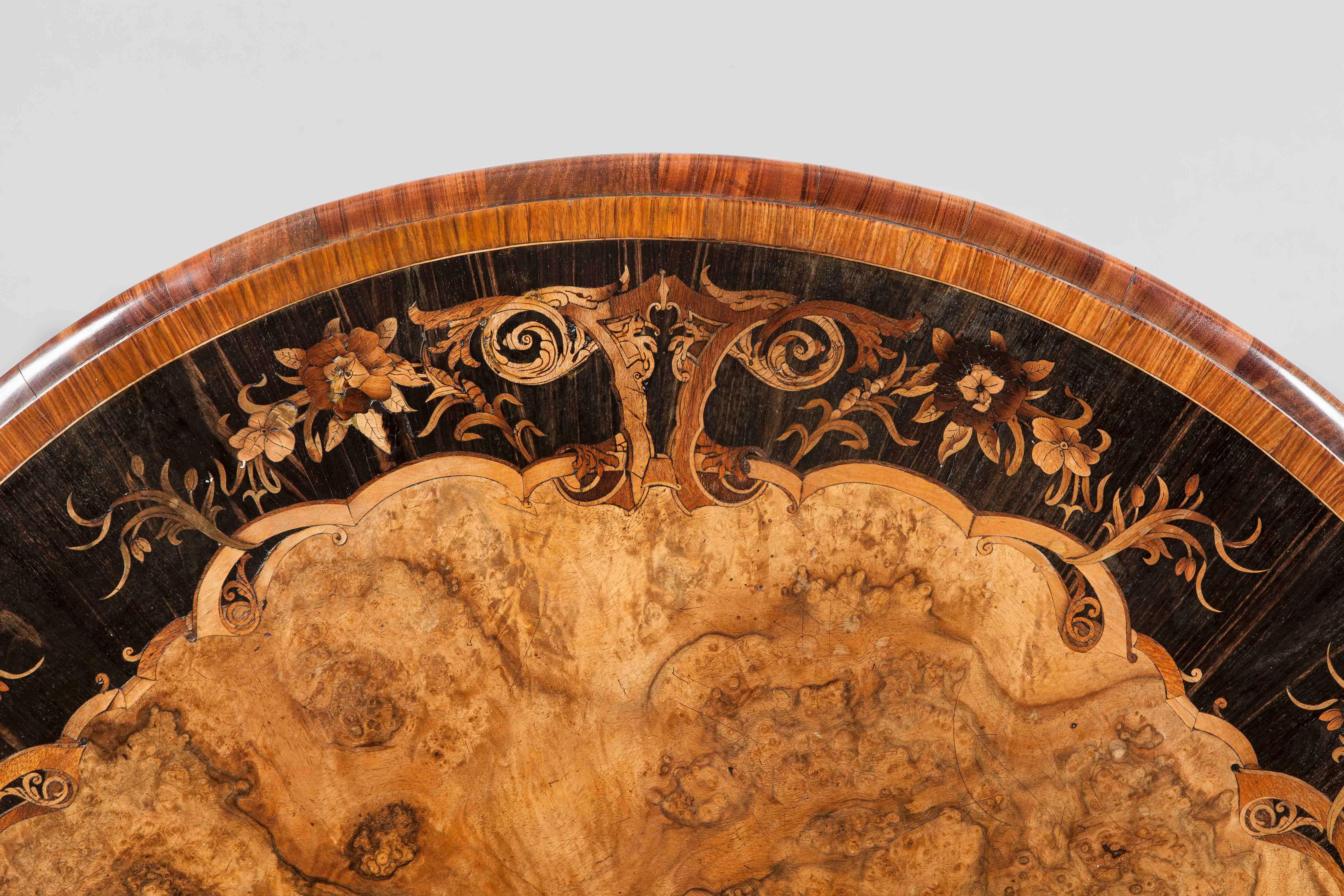 A Marquetry Centre Table by G.J. Morant
After a Design by Richard Bridgens

Constructed using Circassian walnut, with ebony, kingwood, and specimen woods utilised in the inlay work: the piece closely follows the Plate 16 design shown in Bridgen’s