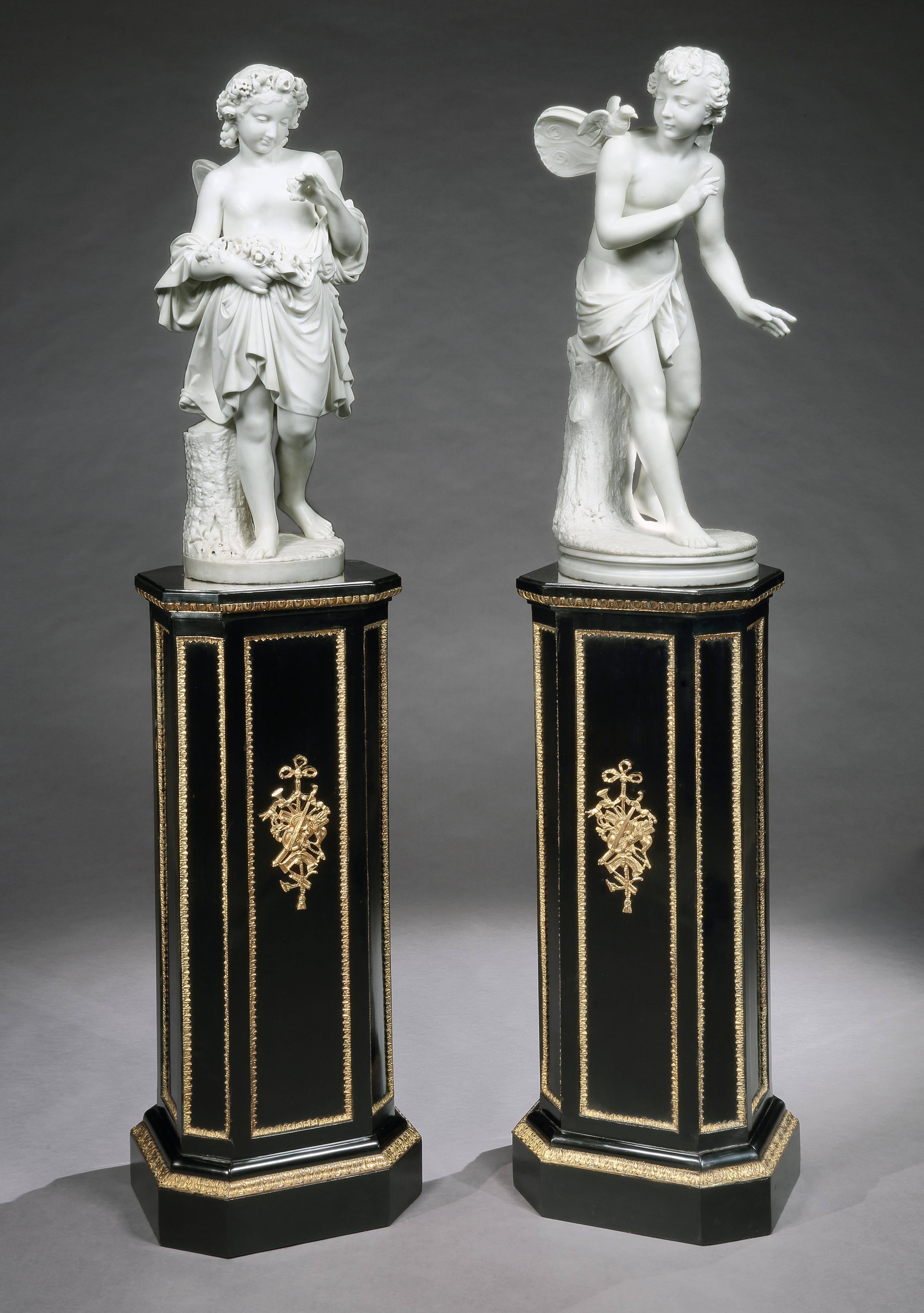 Two Italian, Carrara marbles

Set on circular bases, of Fairies, next to tree stumps; the male fairy regarding a dove perched on his shoulder, the female fairy smiling at the butterfly she holds.
Italian, circa 1880.
  