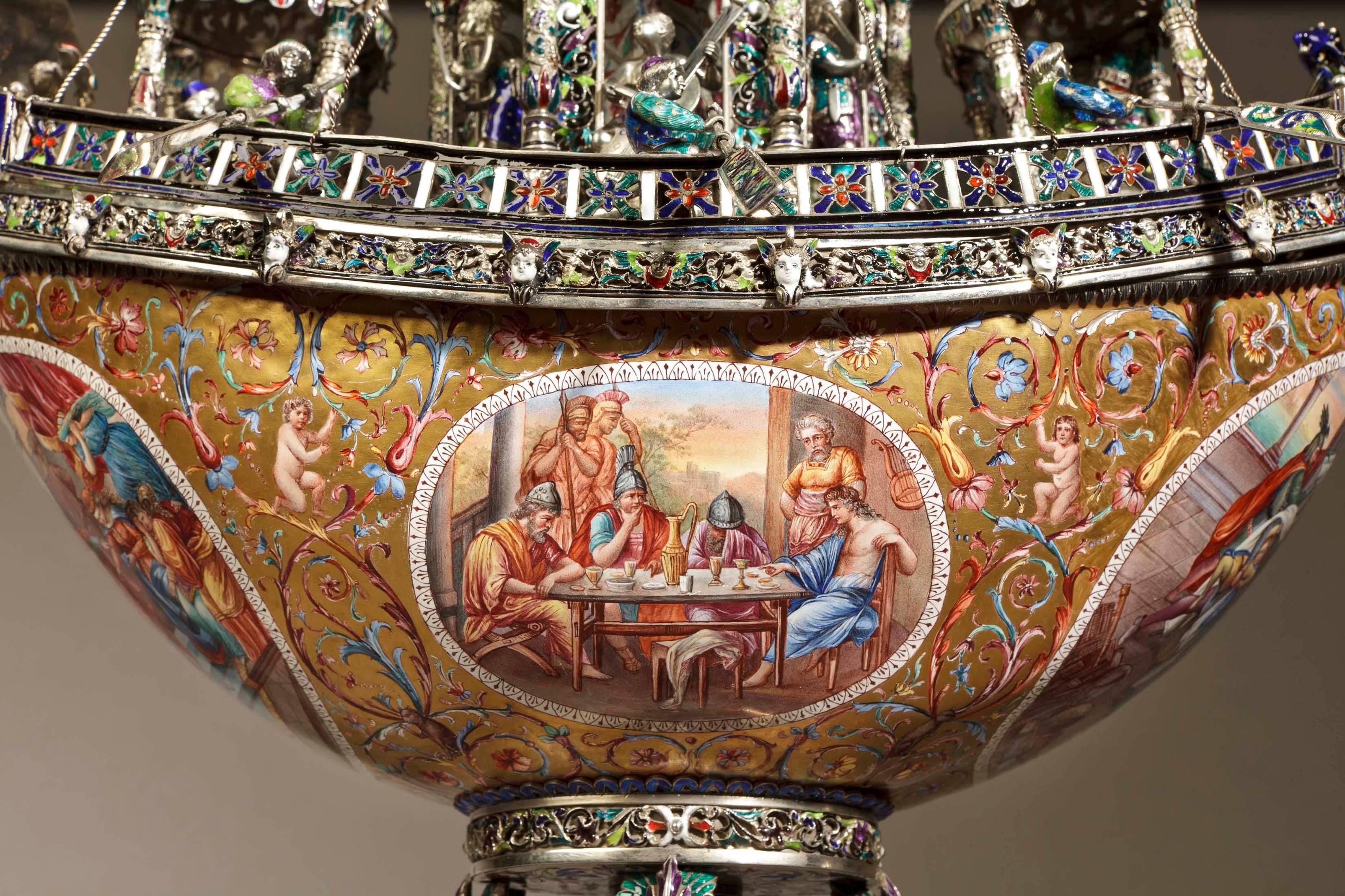 A large and important viennese nef or boat
By Hermann Böhm

Constructed in silver, bearing the maker’s marks, and exquisitely enamelled; the boat form nef, with a detachable enamelled cover, having enamelled ellipses, polychrome decorated with