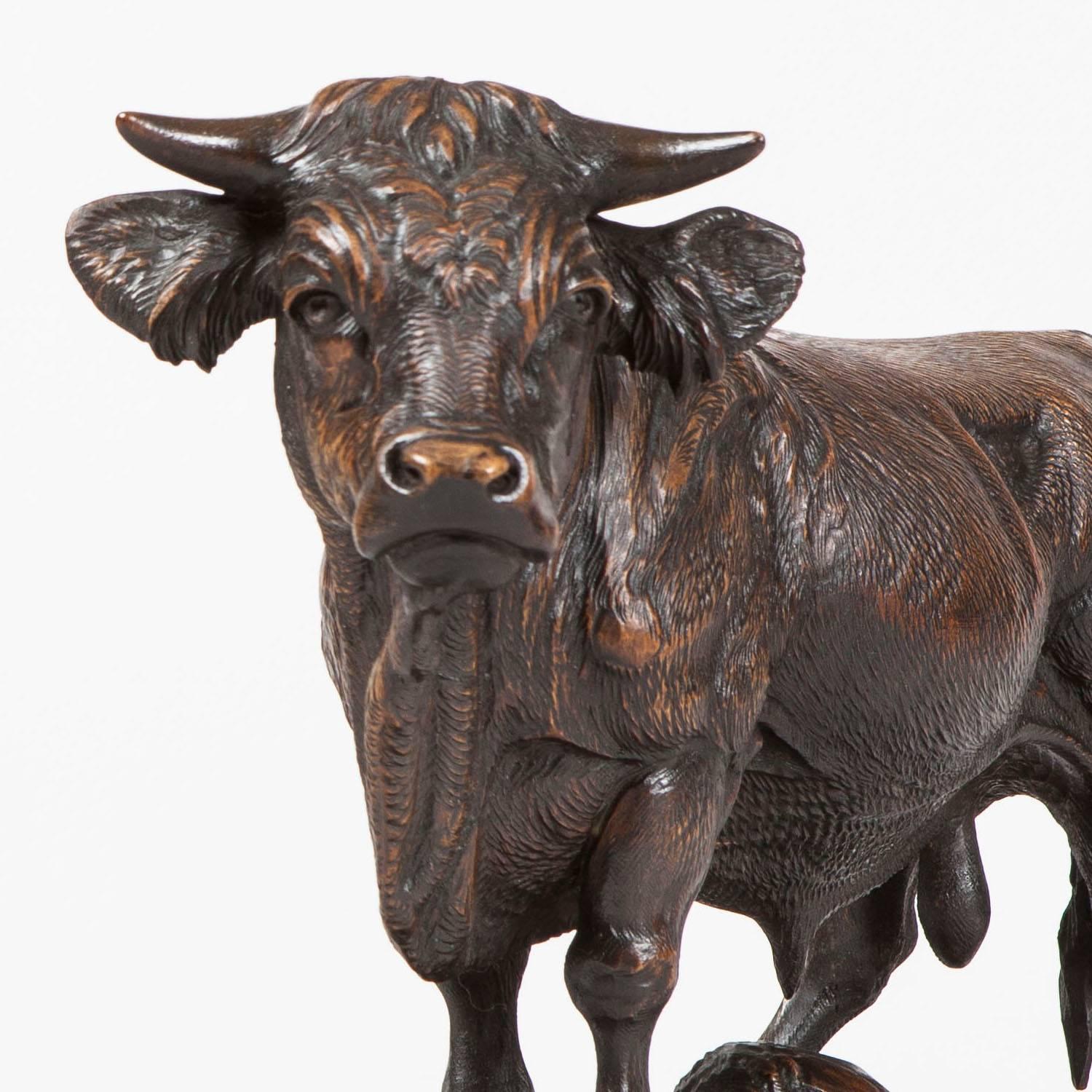 A pair of Black Forest cattle, probably by Johann Huggler

Carved in lindenwood, the naturalistically carved swiss cow and bull stand on elliptical bases.
Brienz Area, circa 1870

Brienz, in the Bernese Oberland, Switzerland was remarked upon