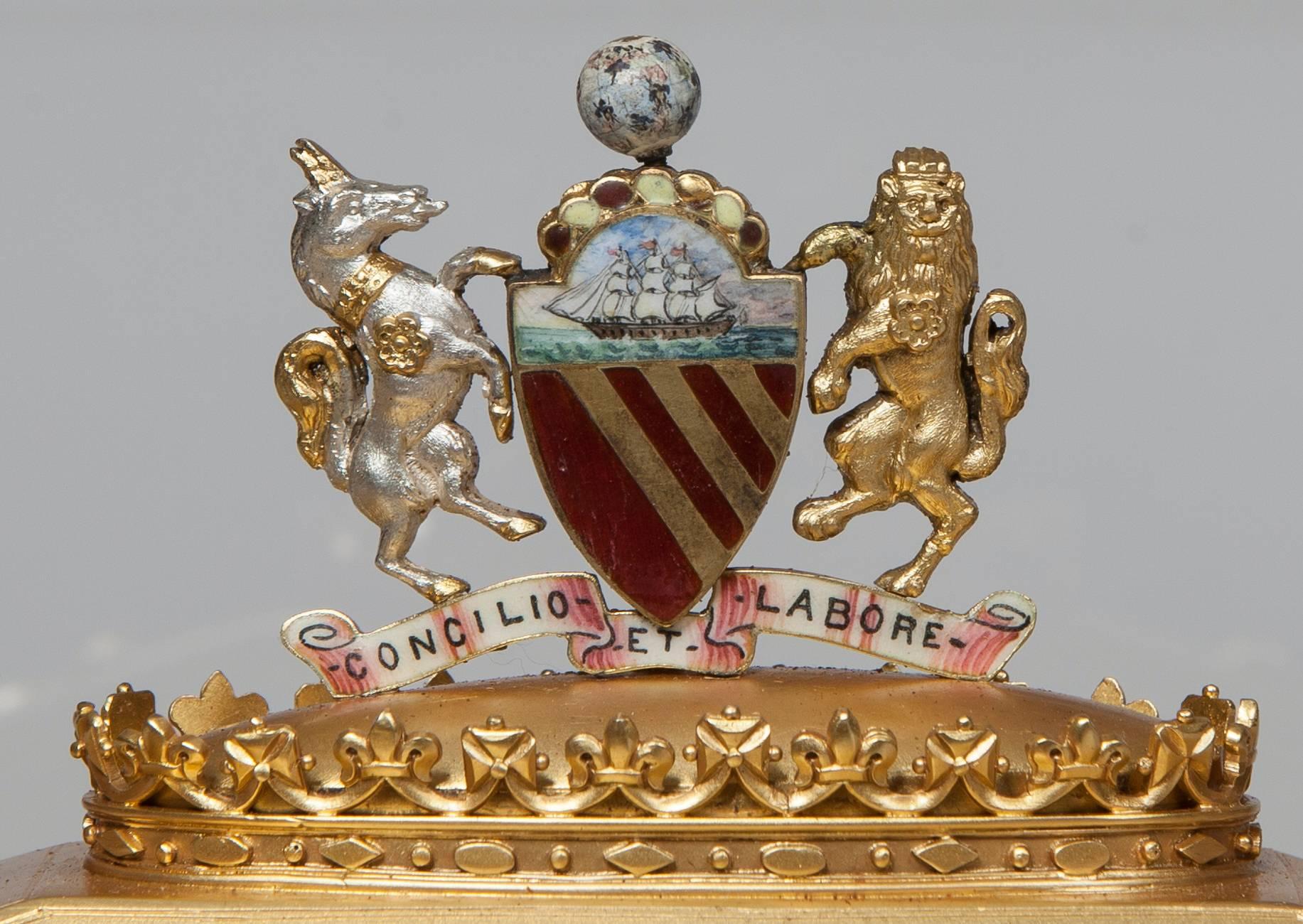 
An Elkington & Company Silver Gilt Presentation Casket
Hall Marked for Birmingham, 1891 and the maker; the casket, in the Victorian Gothic manner, with cluster columns at the angles, with fascias of lancet arches dressed with trefoils, and has a
