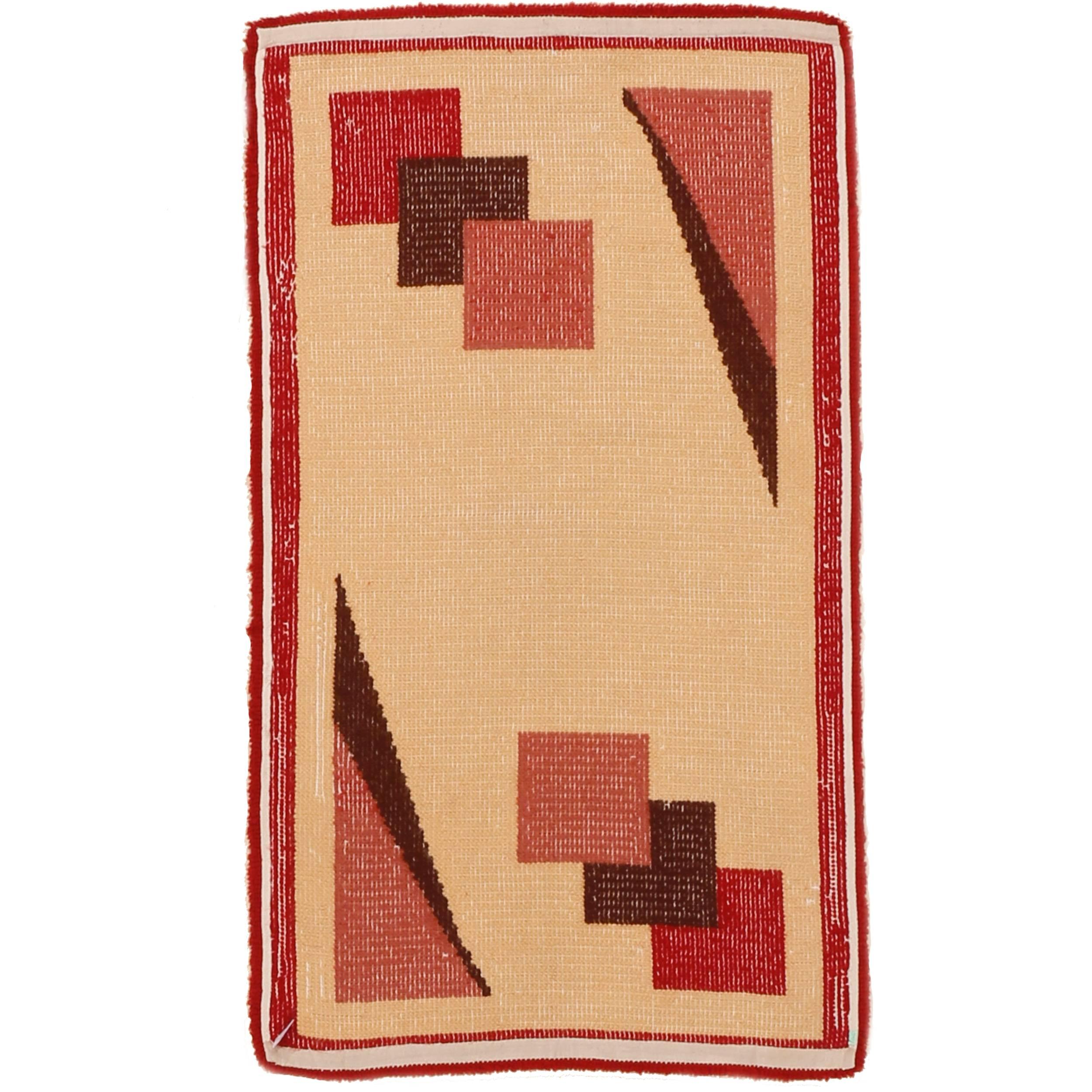 Characterized by a floppy handle and a relatively coarse weave, rugs such as these are referred by European scholars as 'travail domestique,' meaning that they were woven by women at home and not within the context of a large-scale atelier. This