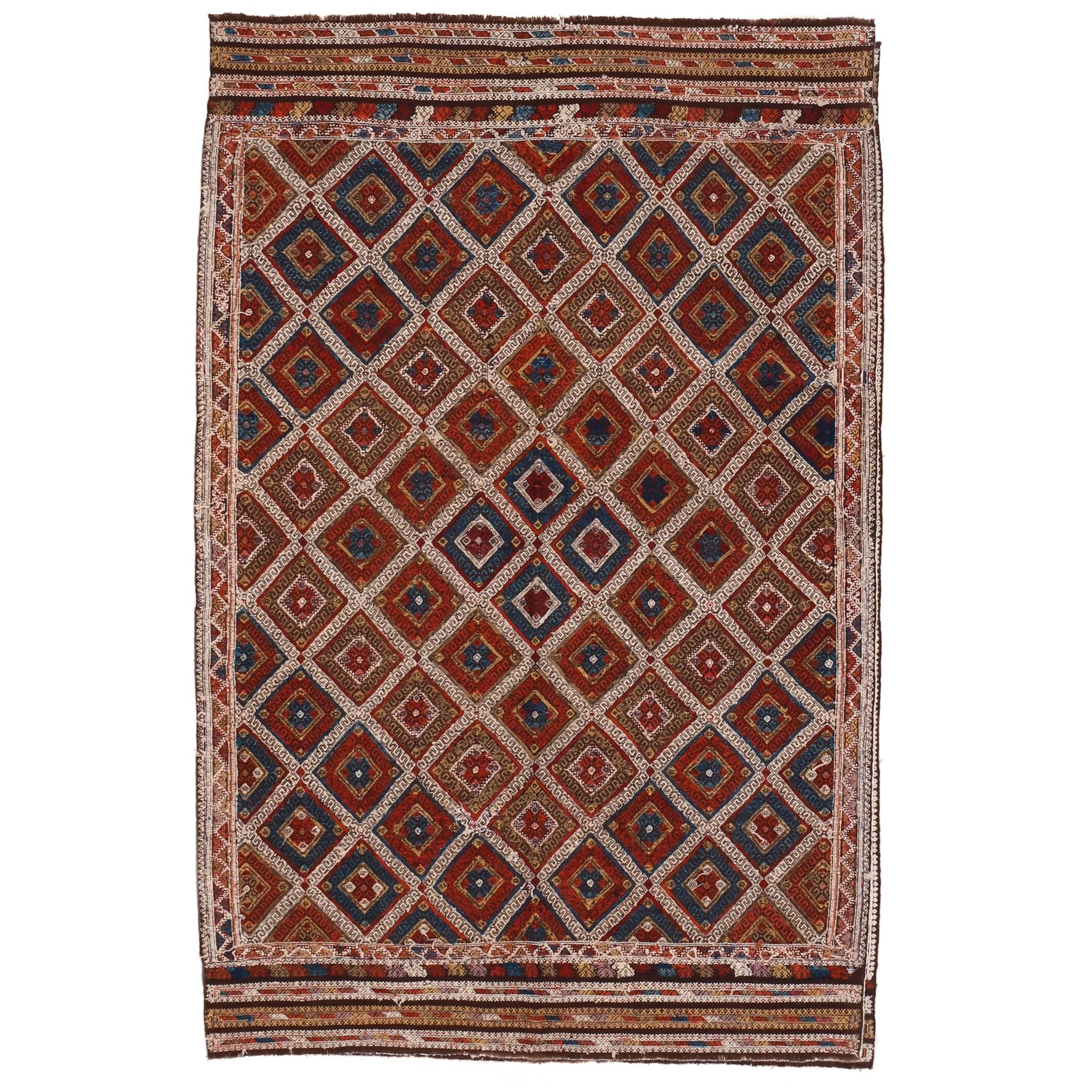 Woven in a complex flat-weave technique known as Zili, this superb example originates from the area of Sivrihisar, located in Cappadocia. The background is entirely in wool and the all-over lozenge pattern is emphasized by contouring each hooked