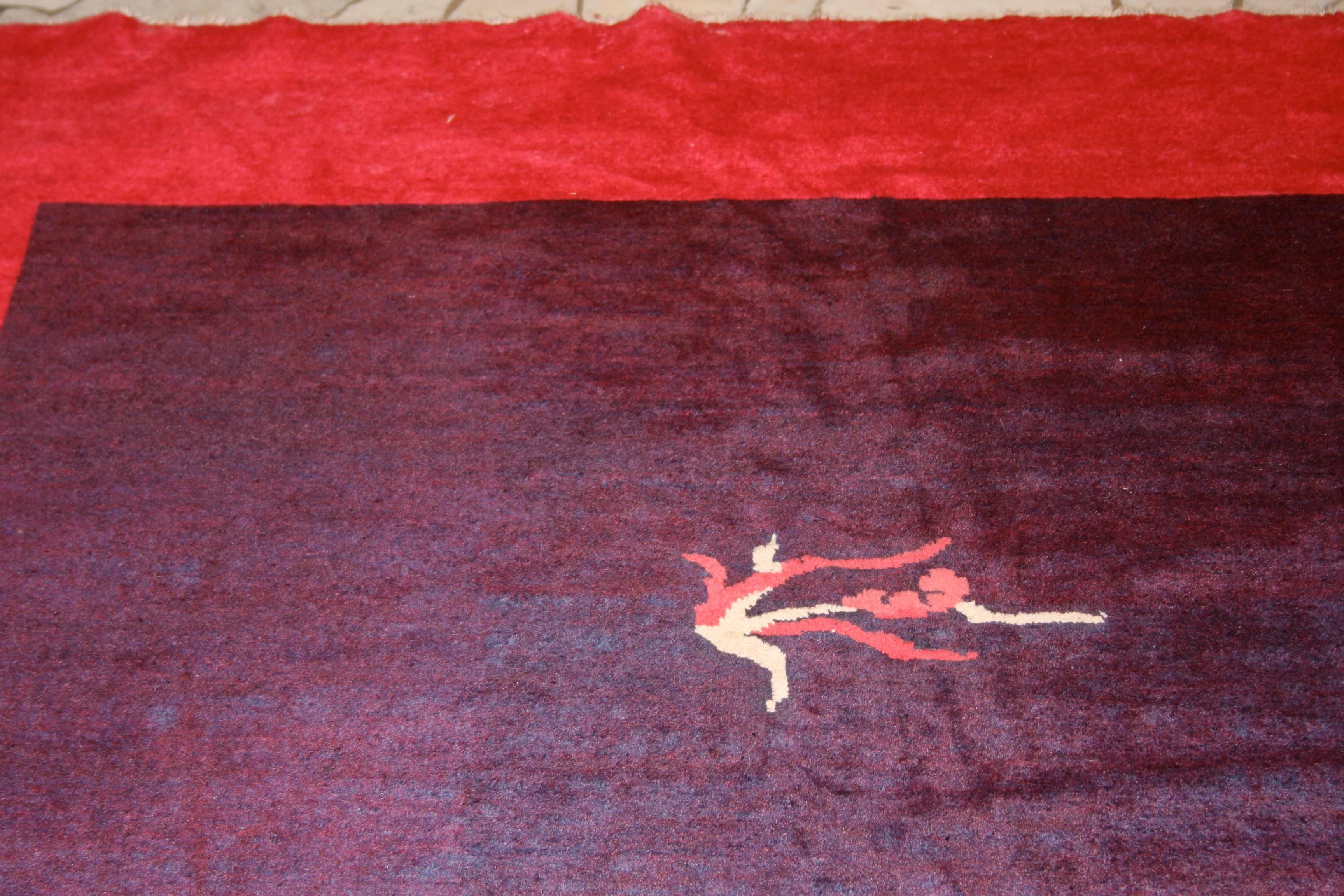An extremely finely woven antique Chinese Peking rug enriched by the use of a very silky wool quality and characterized by an unusual colour palette. The open field background is distinguished by a very elegant aubergine colour obtained through the