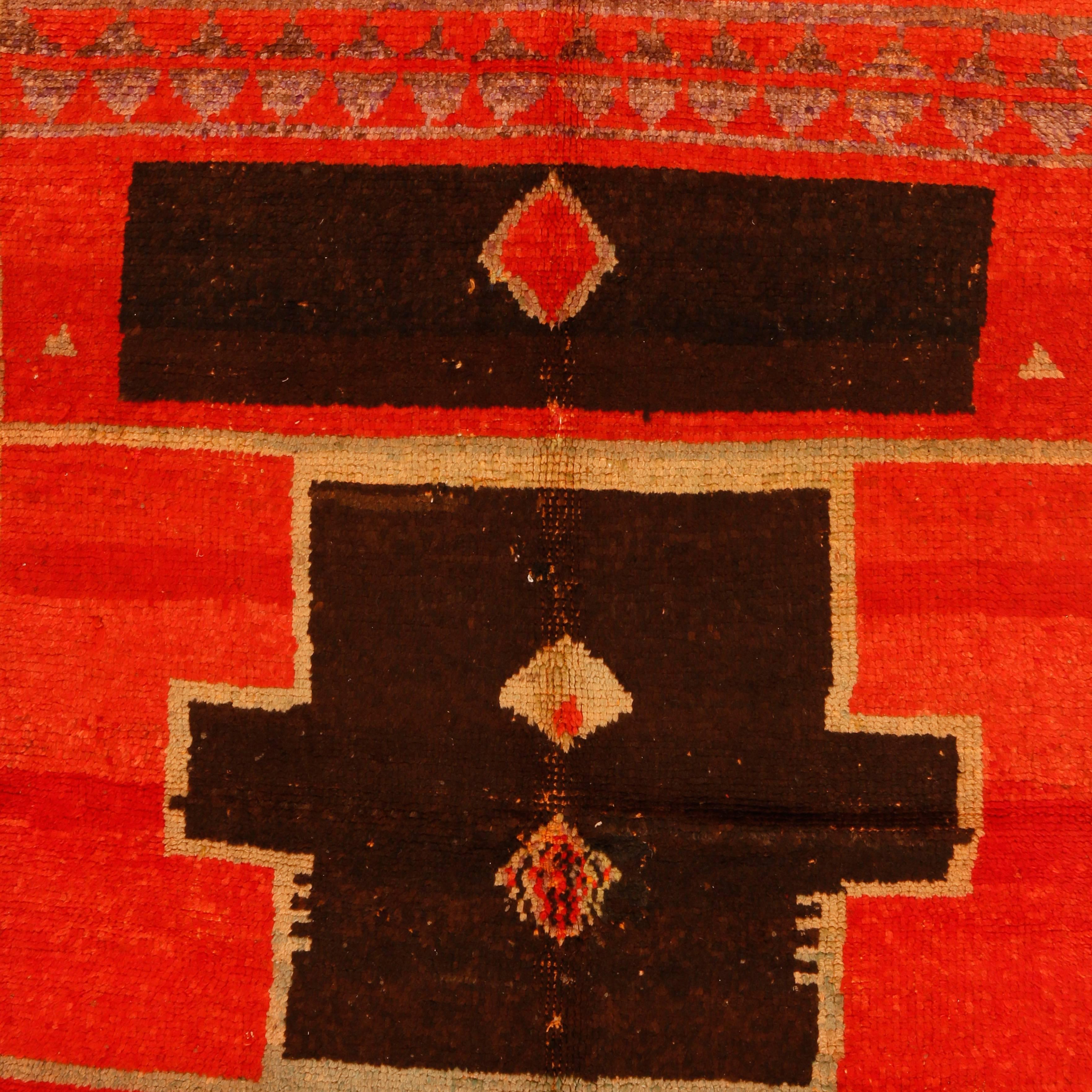 The Berber rugs from the the High Atlas region are often distinguished by an iconography that relates them to more 'classical' tribal rugs, such as those of Anatolia and the Caucasus. This early example from the Taroudant area displays a cruciform