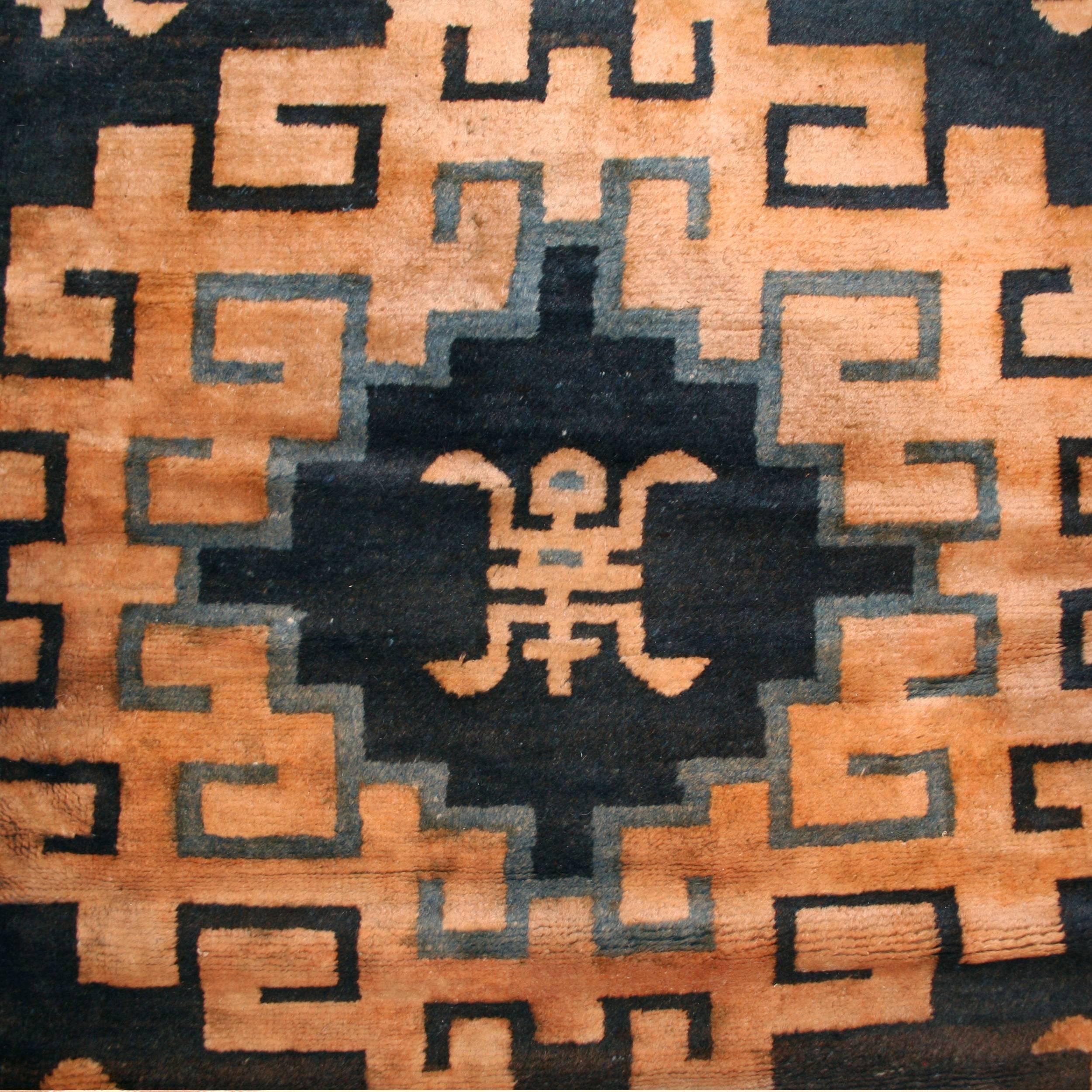 The rare carpets of Mongolia have in recent years achieved a stature of their own. They differ from traditional 19th century Chinese carpets in that they typically employ stylized patterns taken from early Chinese iconography and favour a palette of