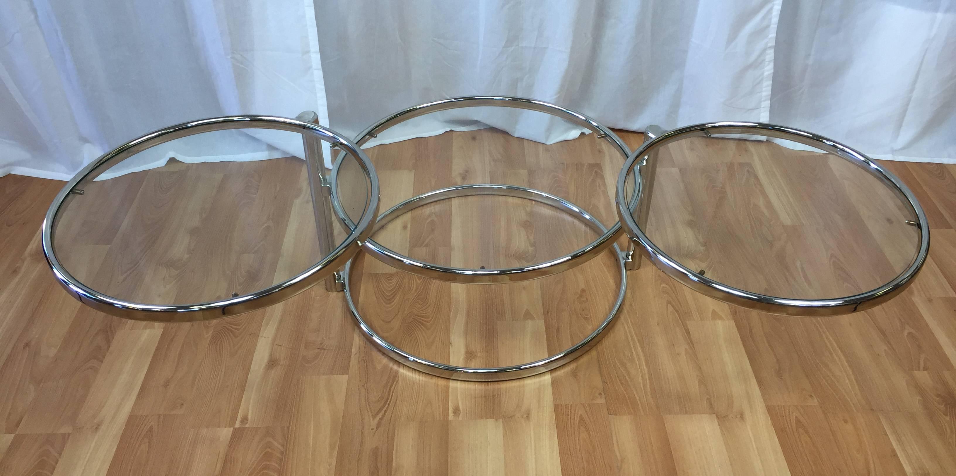 Late 20th Century Milo Baughman Style Swiveling Nickel and Glass Coffee Table