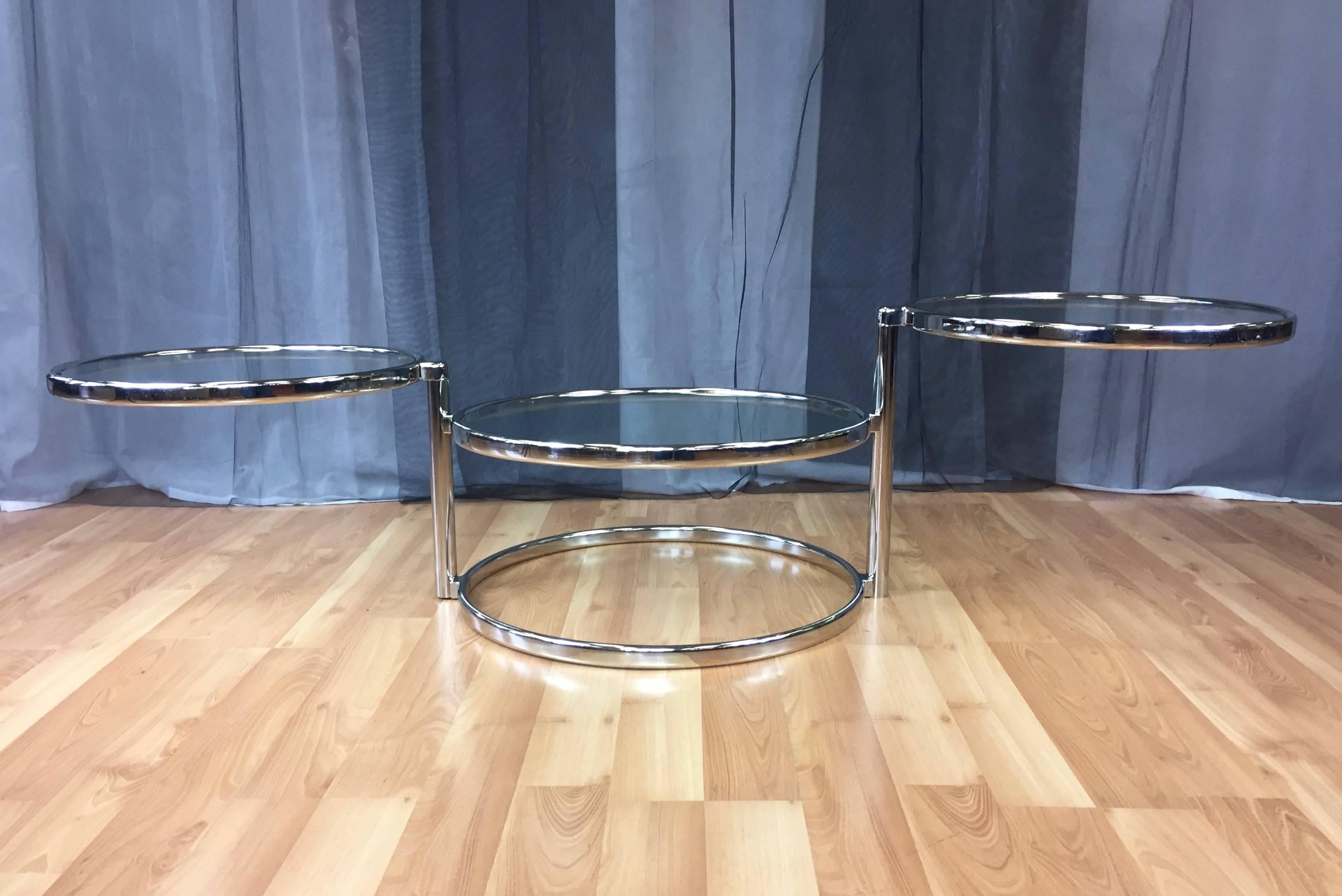 American Swiveling Nickel and Glass Table in the Manner of Milo Baughman