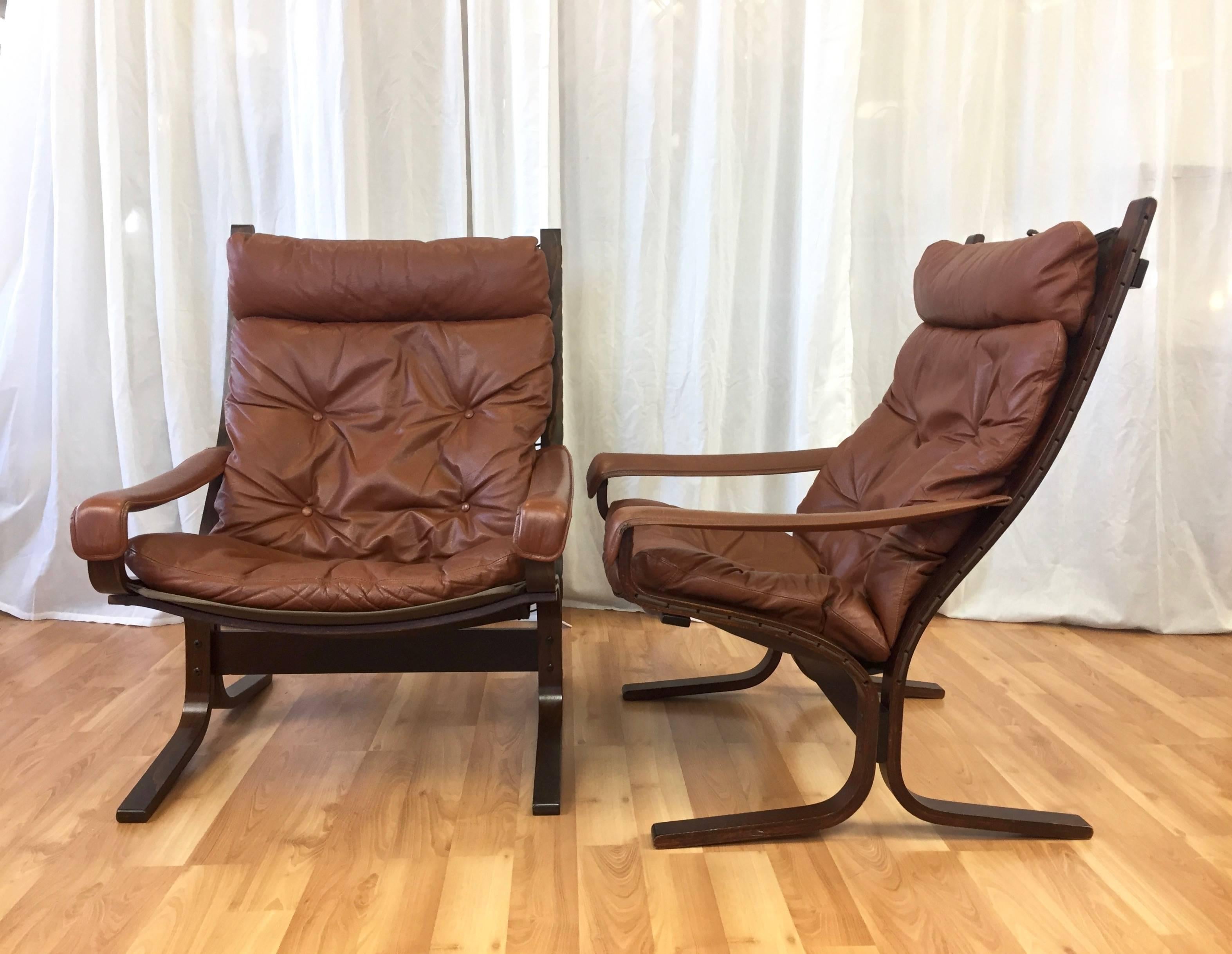 A pair of Westnofa “Siesta” bentwood leather lounge chairs by Ingmar Relling.

A Scandinavian Classic that owes its enduring popularity and collectability to Relling’s aesthetically influential, exceptionally ergonomic design. Curvaceous