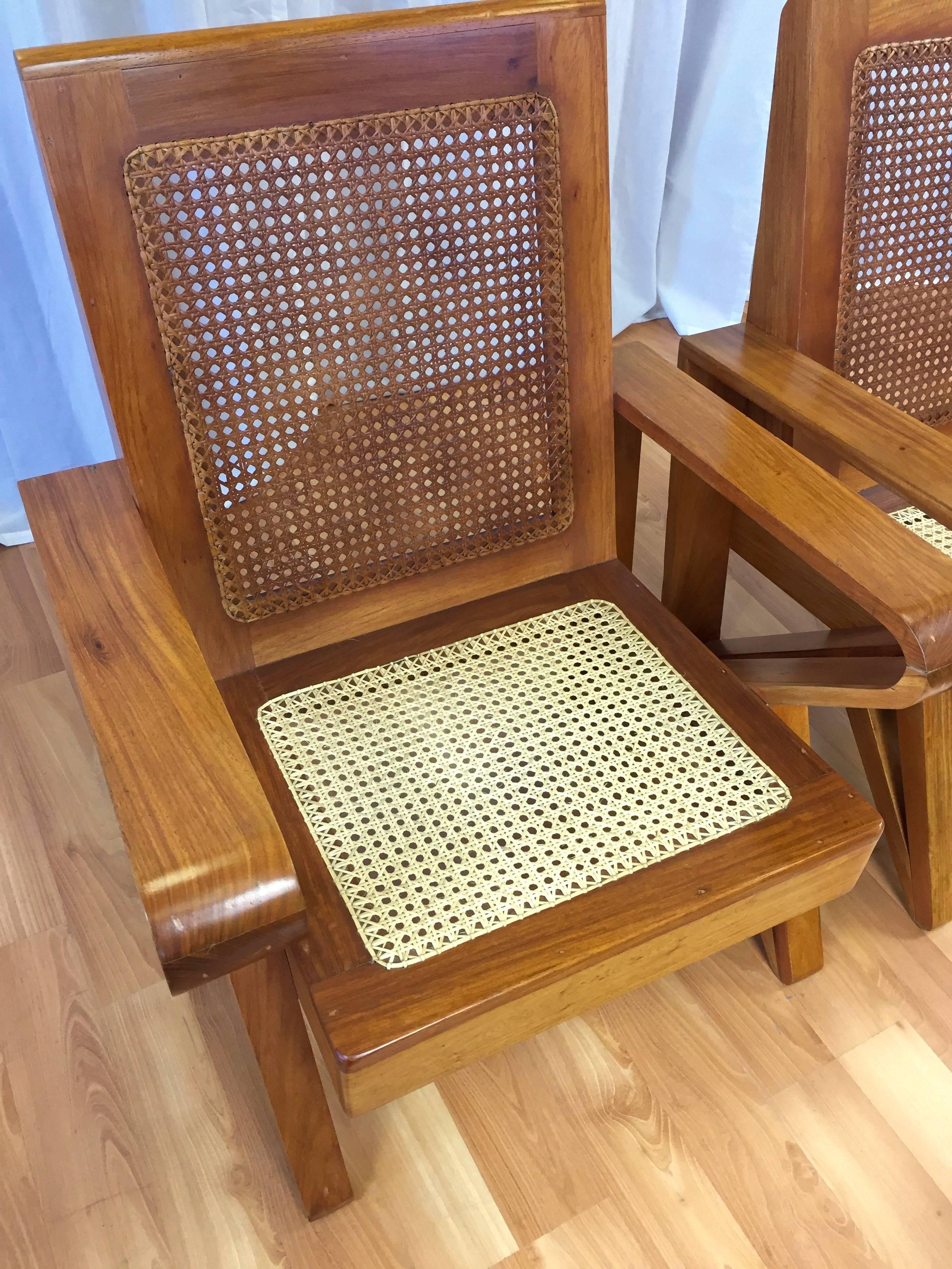 American Uncommon Pair of Hawaiian Koa Wood and Woven Cane Lounge Chairs