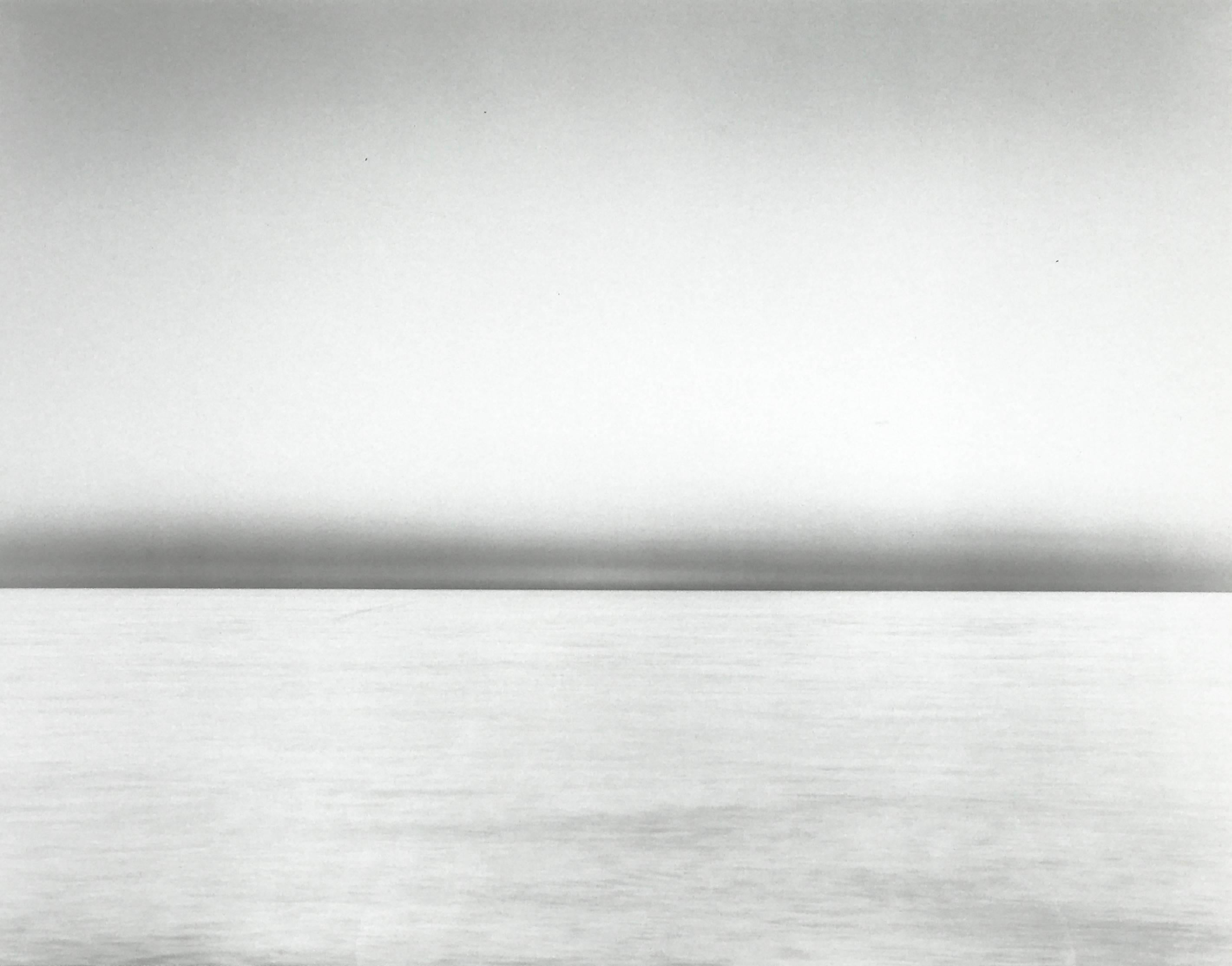 A signed, dated and numbered silver gelatin print titled “Captiva Island, Florida” by American photographer Chip Hooper (1962–2016).

A serenely contemplative black-and-white work exemplifying the deeply emotional undercurrent of seascape-focused