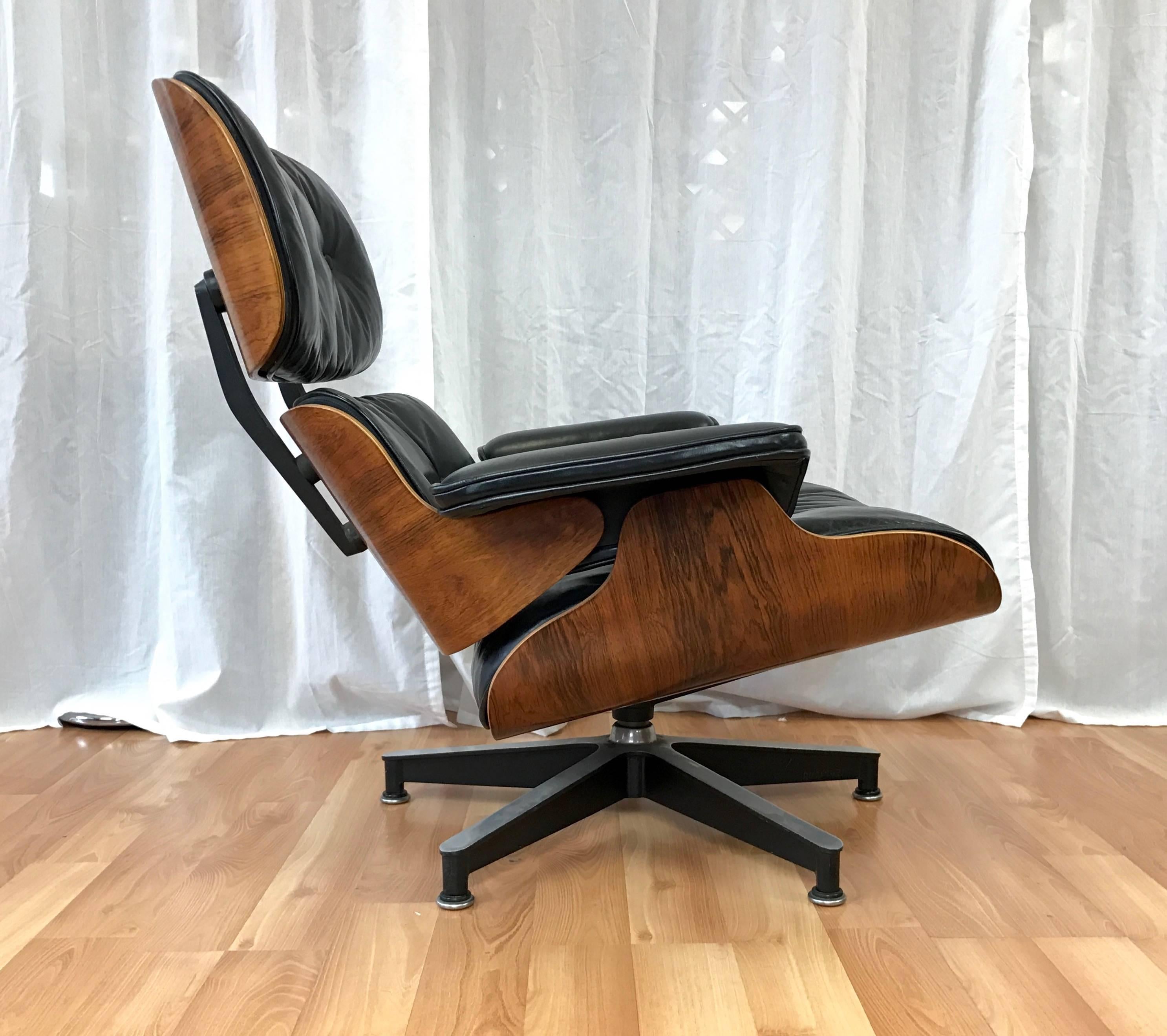 Mid-Century Modern Vintage Eames Model 670 Lounge Chair & Ottoman in Rosewood and Black Leather