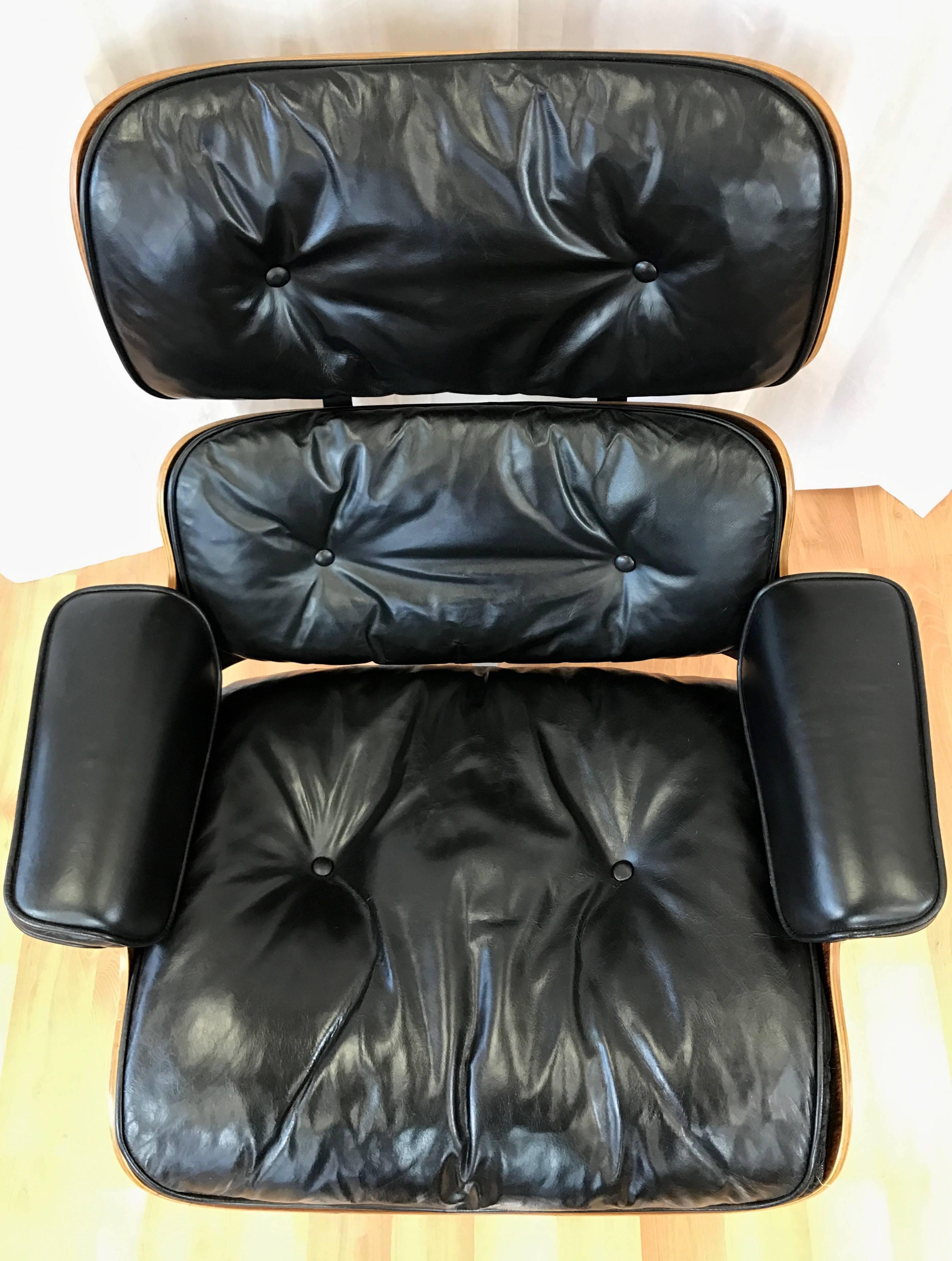 Vintage Eames Model 670 Lounge Chair & Ottoman in Rosewood and Black Leather 1
