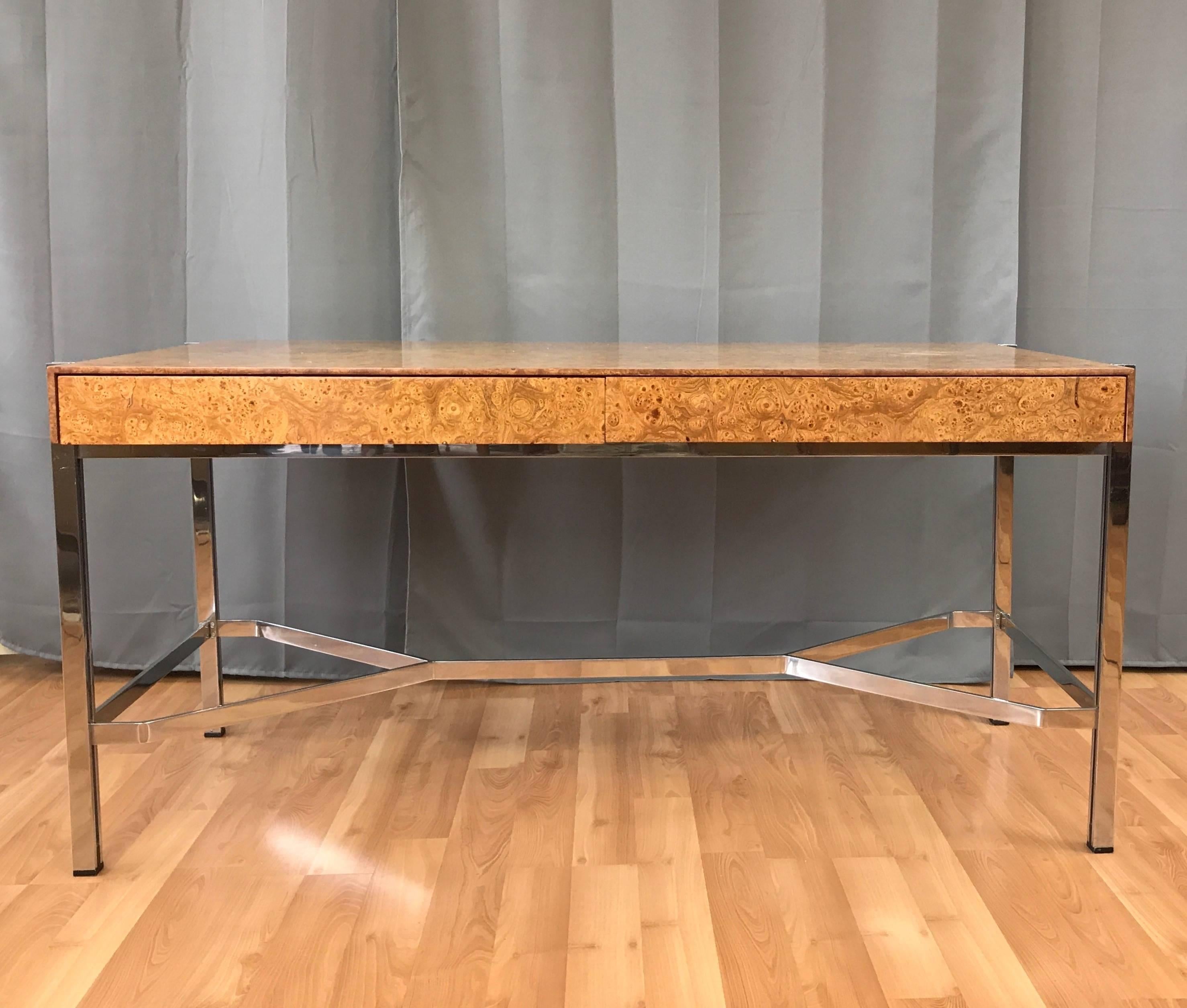 An absolutely amazing minimalist vintage desk in elm burl veneer and chromed steel by Jack Freidin for Pace. 

Expansive top and clean sides distinguished by dazzling bookmatched Carpathian elm burl veneer with an extremely lively figure that evokes