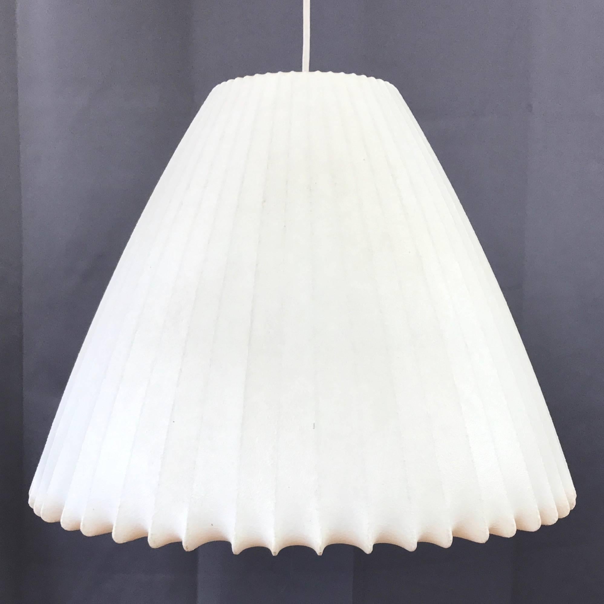A very rare vintage bell-shaped hanging Bubble Lamp by George Nelson for the Howard Miller Clock Company.

Designed in 1952, its shape and size are of a scarce combination that sets it apart from the myriad other more common original and