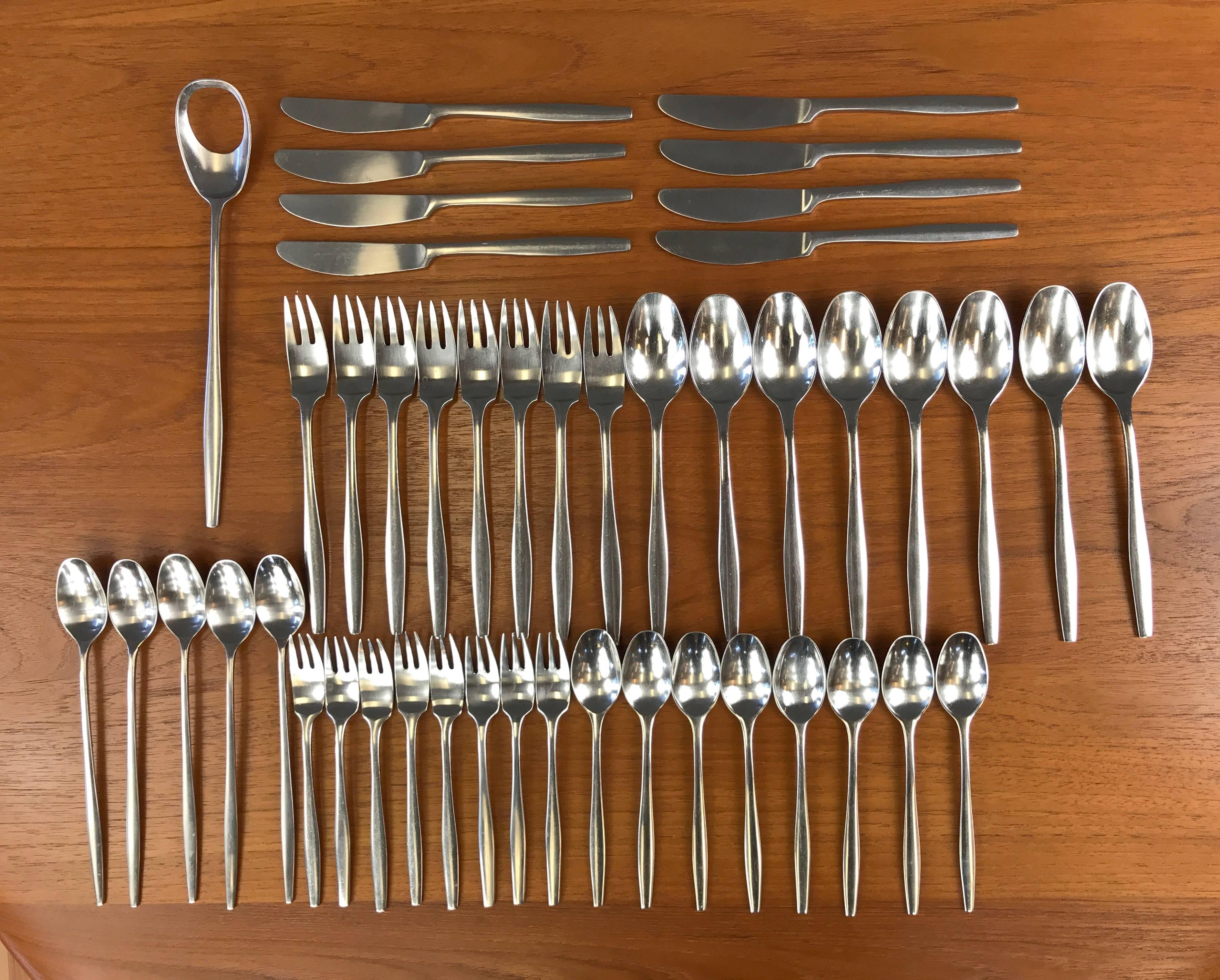 A vintage “Variation V” 46-piece stainless steel flatware service for eight designed by Jens Quistgaard for Dansk Designs in 1957.

Perfectly balanced, with a slender handle and elegantly tapered waist. The forks and serving utensil in particular