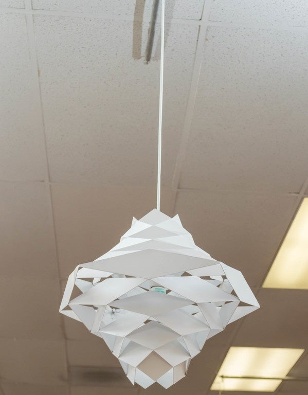 Stunning all metal pendant light, made of interlocking rhomboid shapes, and pentagonal rings. White in color, by Preben Dal for Hans Følsgaard A/S, Denmark
