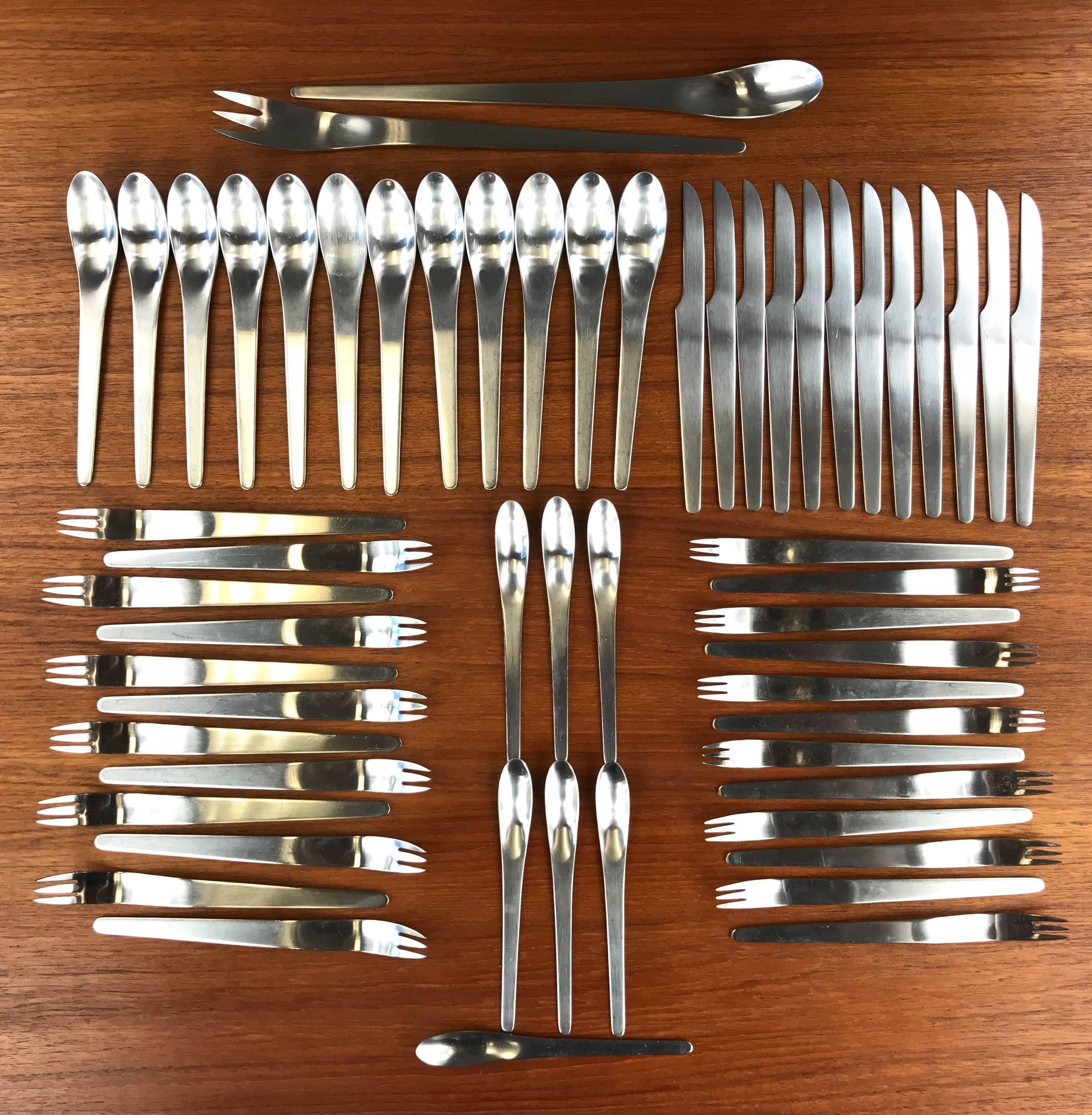 A vintage “AJ” 57-piece stainless steel flatware service for twelve by Arne Jacobsen for Georg Jensen.

Designed in 1957 by Arne Jacobsen for Georg Jensen, this iconic pattern’s futuristic minimalism is considered by many to represent the ideal