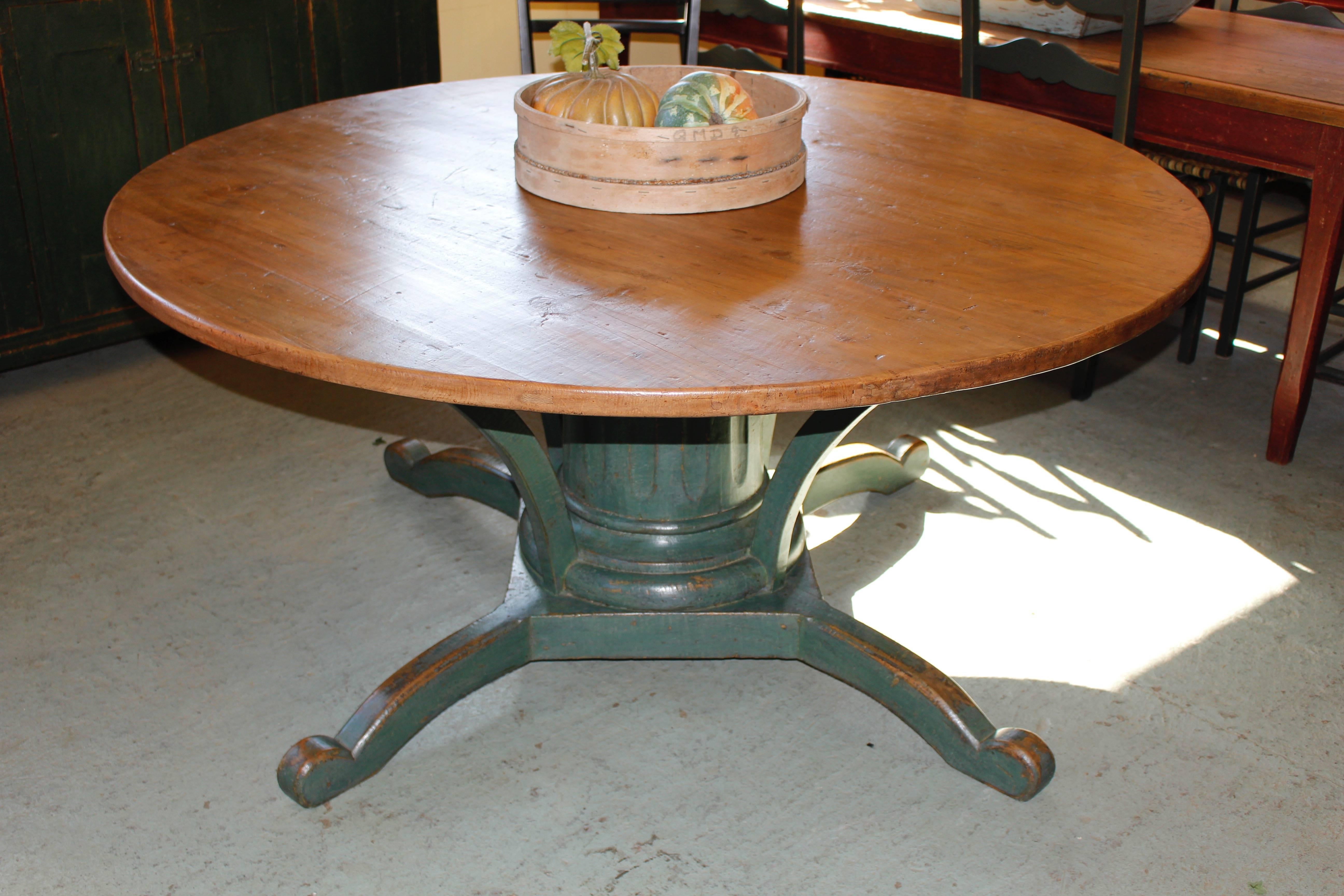 Large round pedestal table.